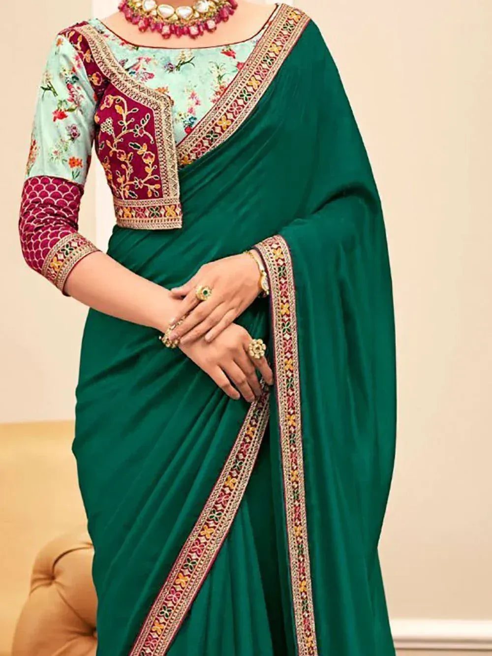 Emerald green saree with floral embroidered blouse, perfect for Indian ethnic wear occasions