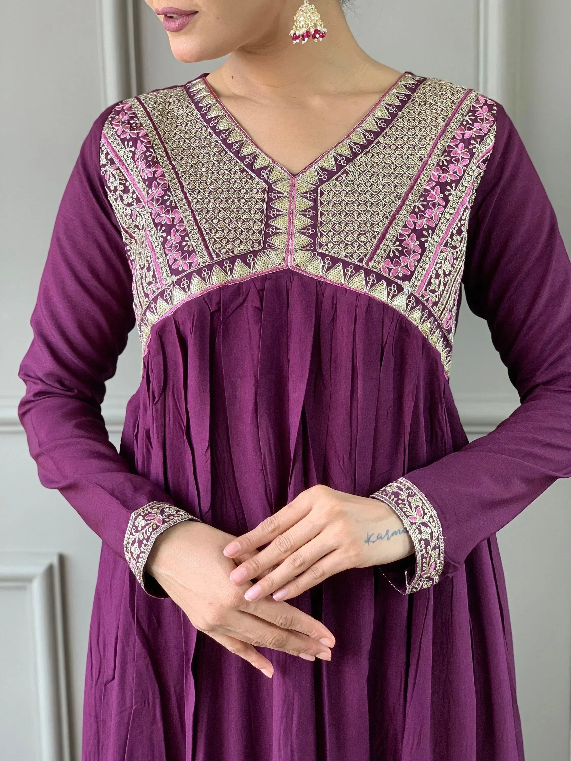 Purple ethnic kurti with gold and pink embroidery, long sleeves, V-neck, perfect for Indian wear