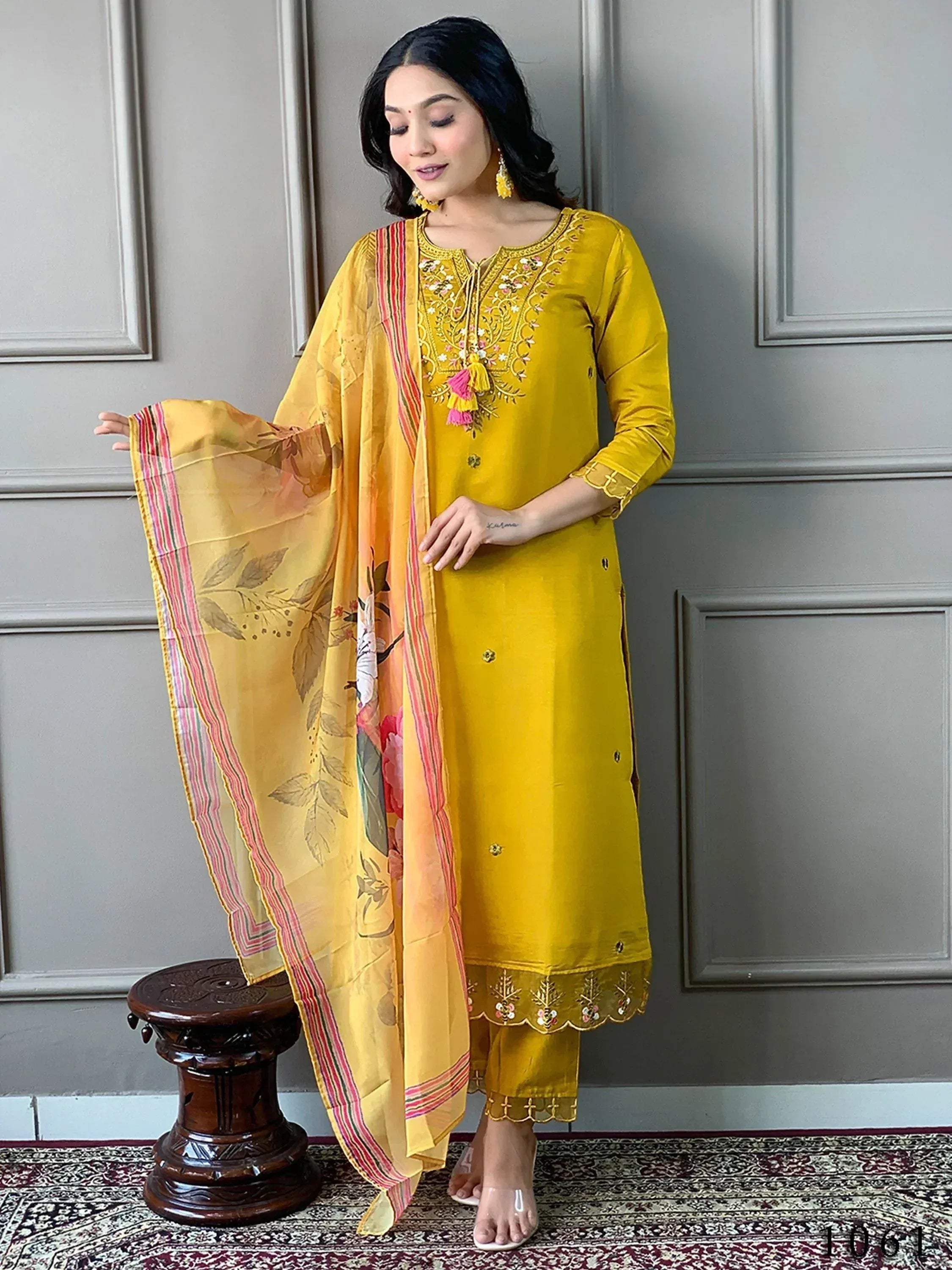 Yellow embroidered salwar kameez with floral dupatta, ethnic Indian wear for women