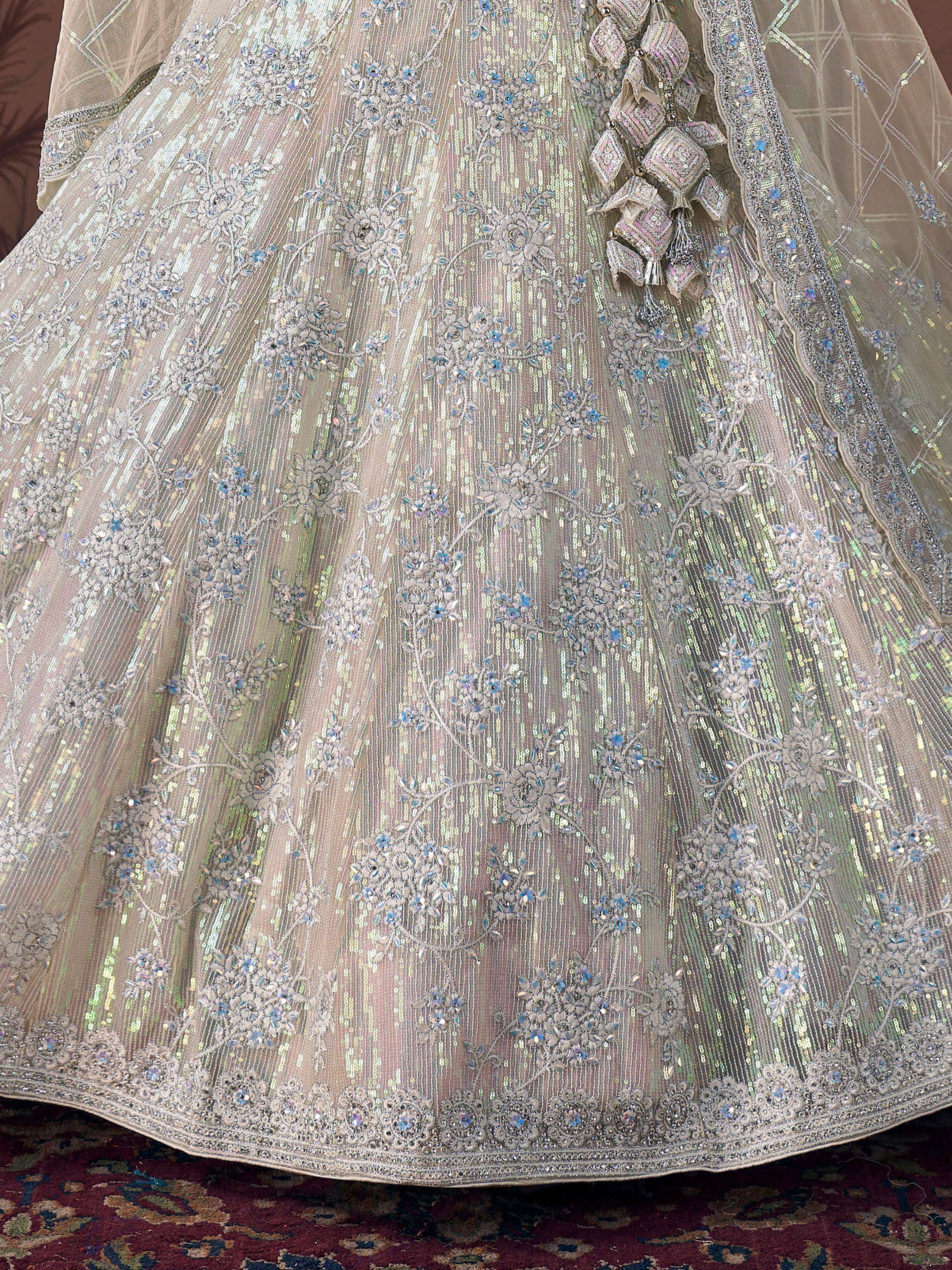 Elegant silver lehenga with floral embroidery and sequin detailing for Indian ethnic wear