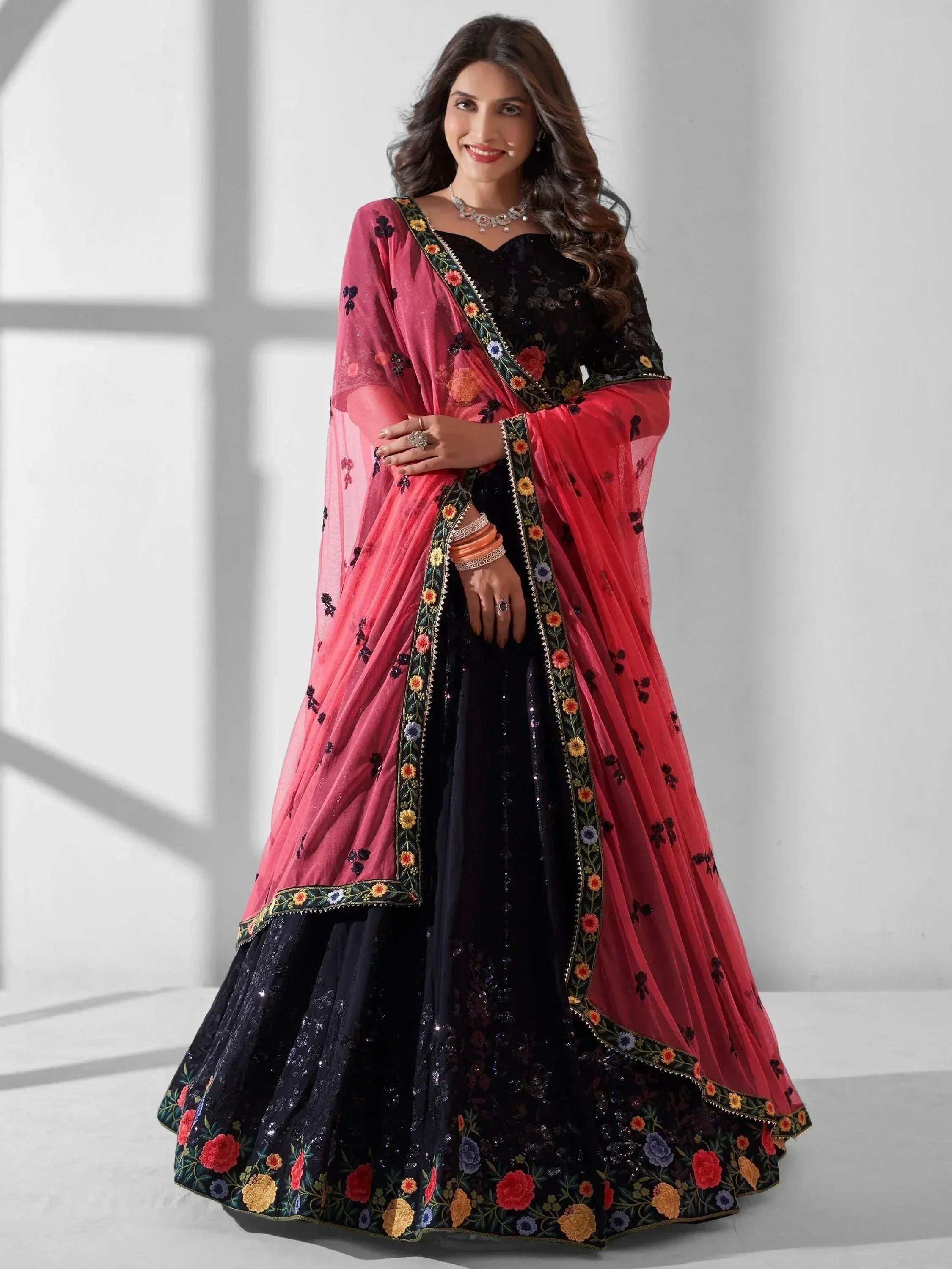 Black floral embroidered lehenga choli with pink dupatta, Indian ethnic wear for women