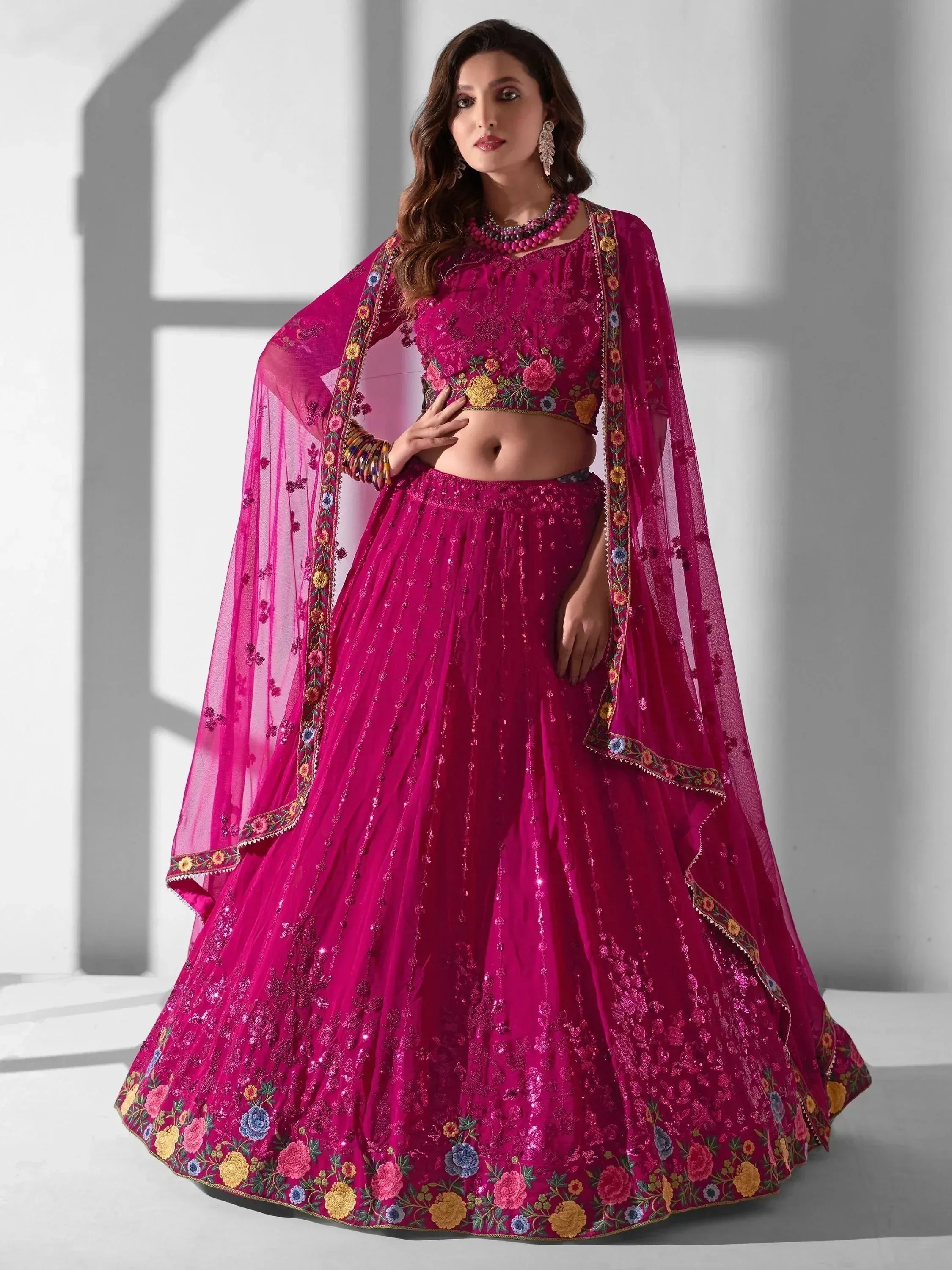Fuchsia embroidered lehenga choli with floral dupatta, Indian ethnic wear for weddings and festivals