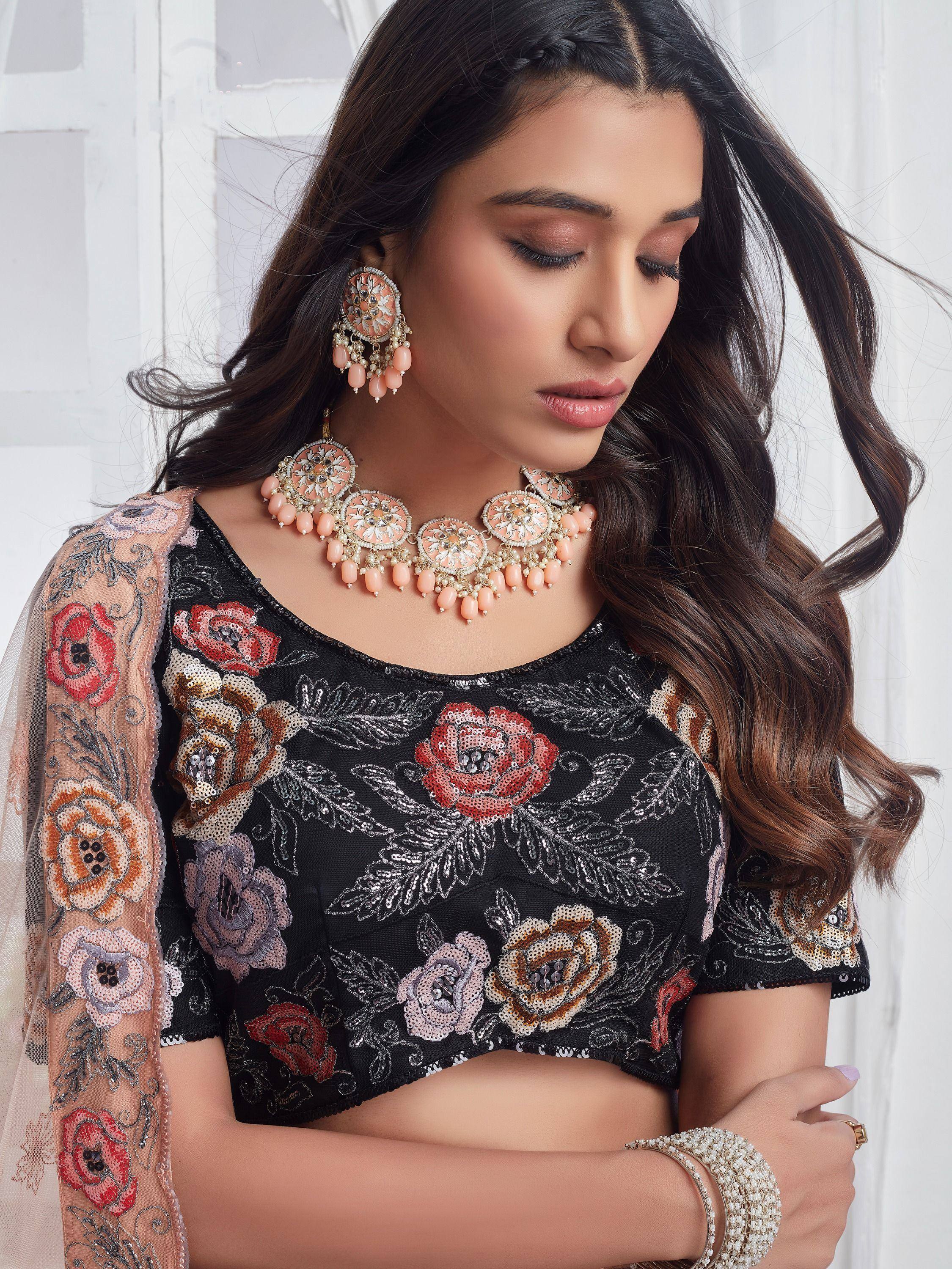 Black floral sequin blouse with peach embroidery, matching jewelry for Indian ethnic wear