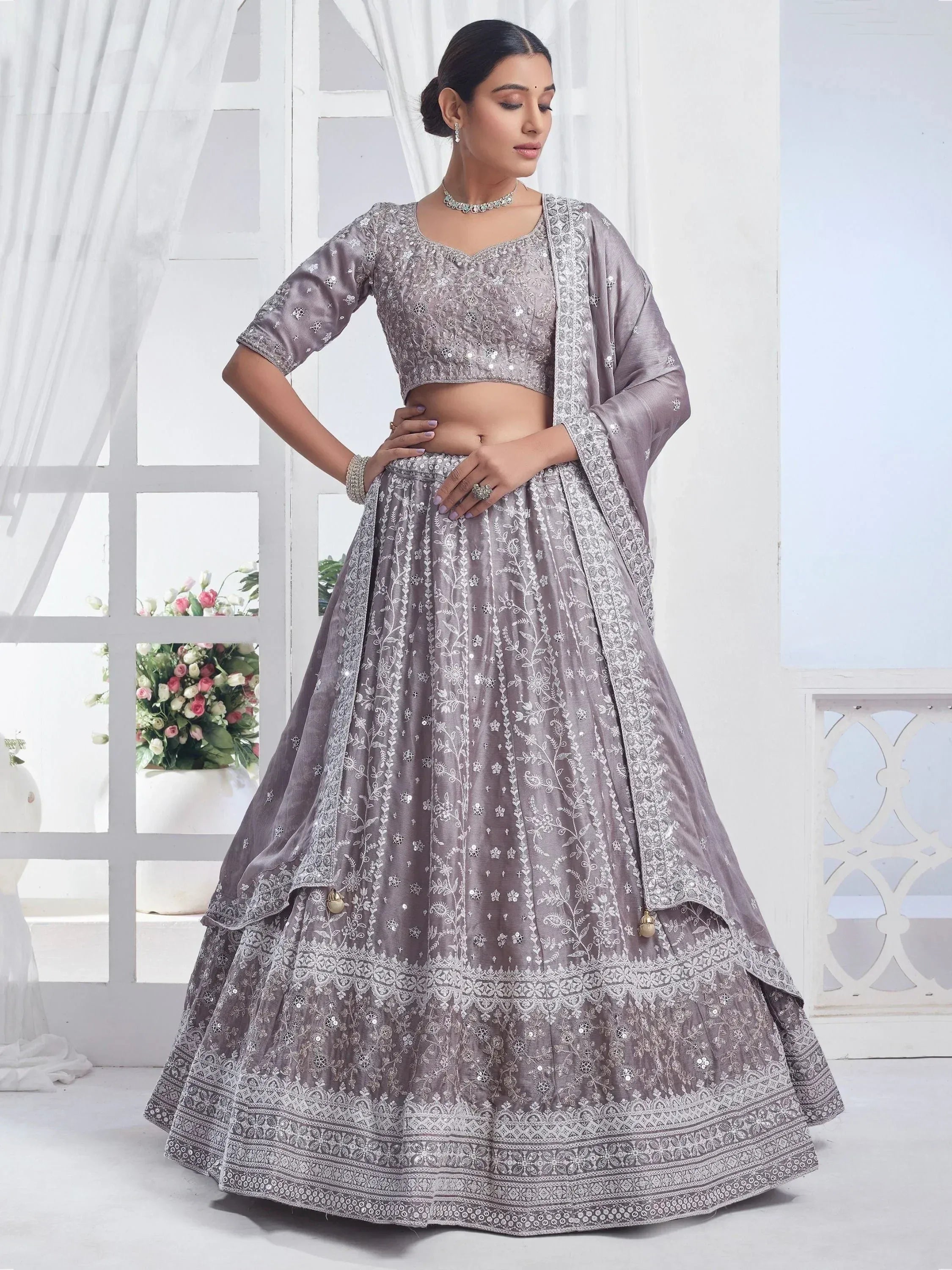 Elegant grey embroidered lehenga choli with floral detailing and matching dupatta for Indian ethnic wear