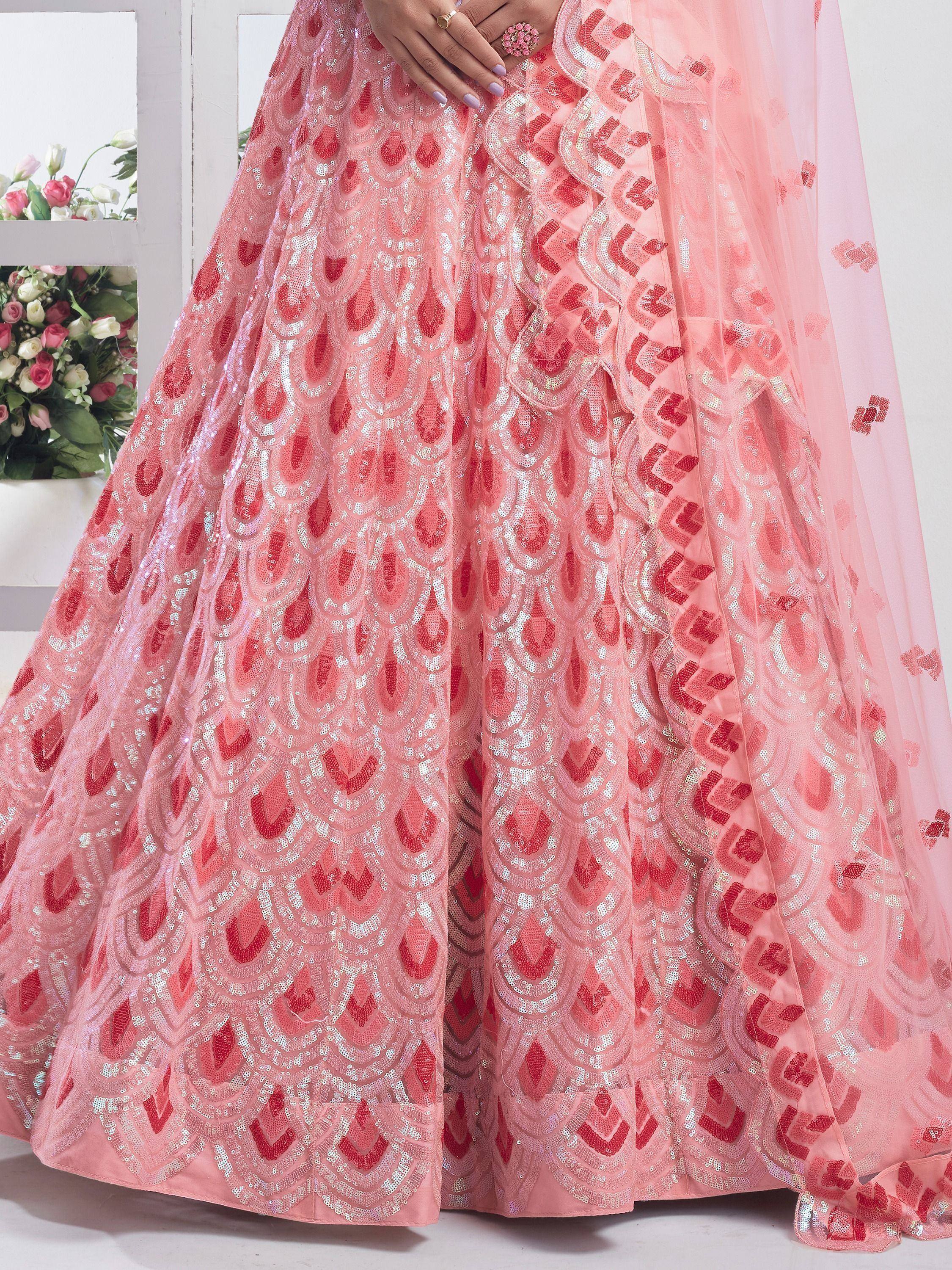 Pink designer lehenga with red and silver sequin embroidery, perfect for Indian ethnic wear occasions.