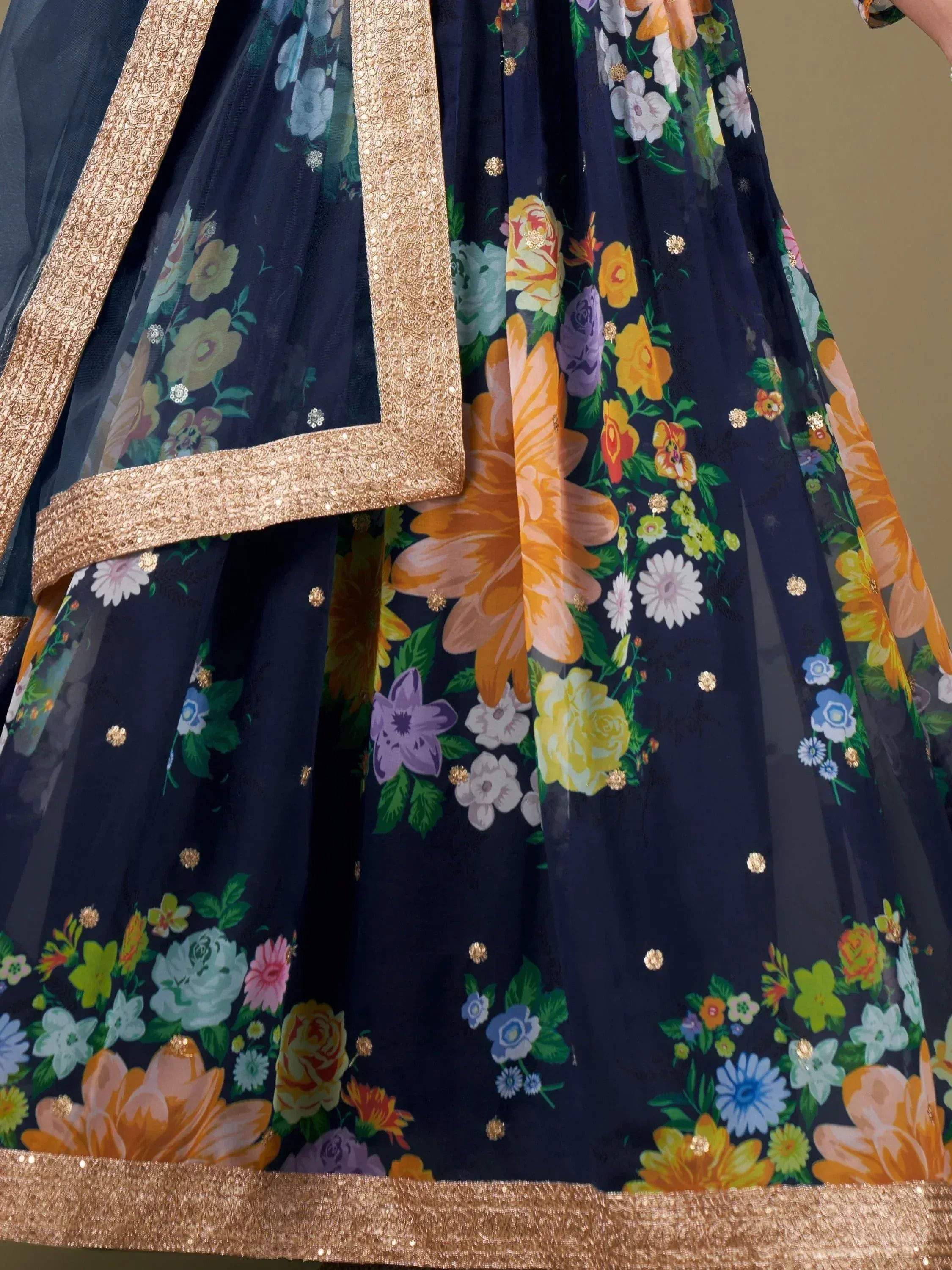 Navy blue floral lehenga with gold sequin border and vibrant printed flowers for Indian ethnic wear