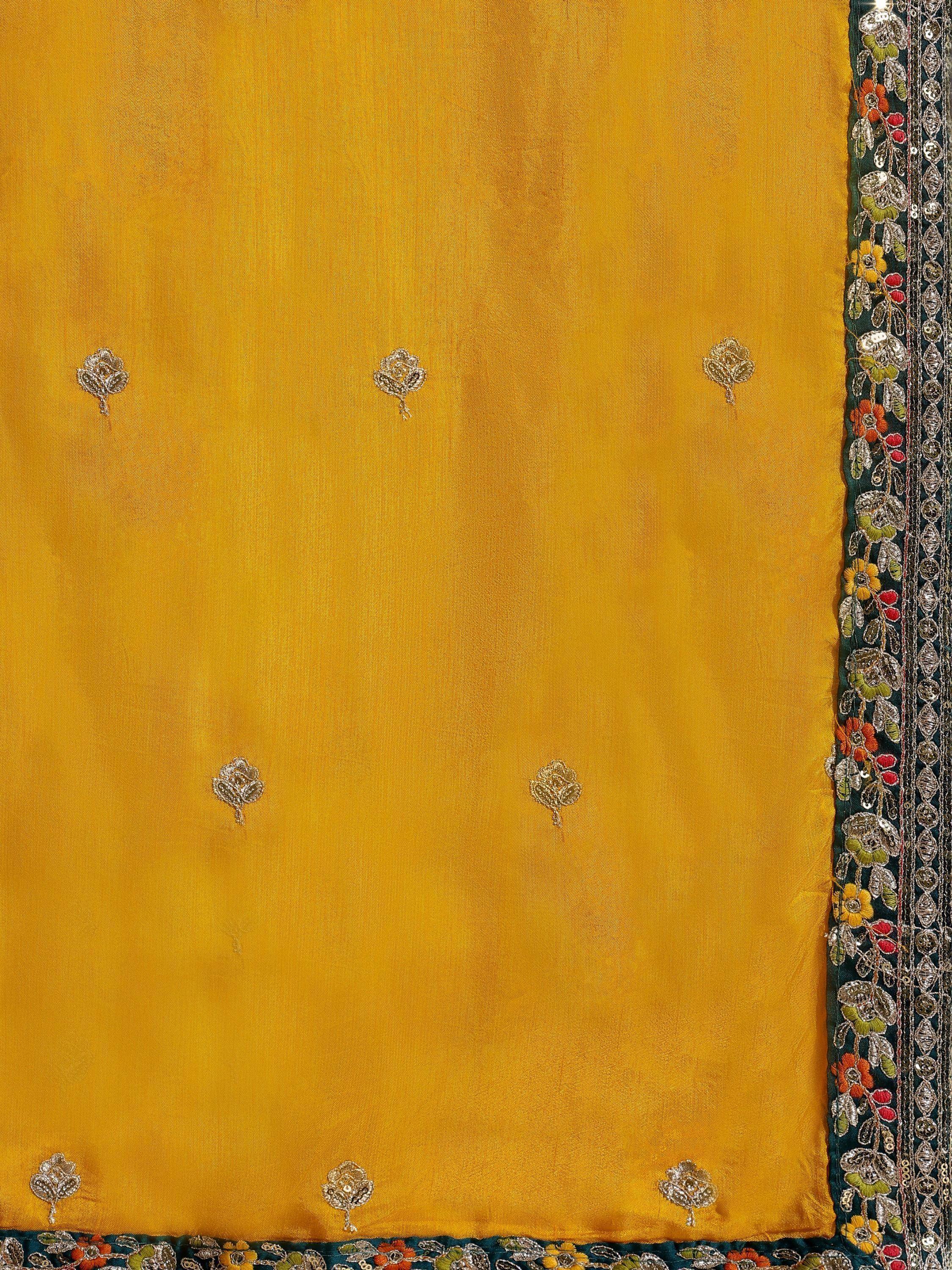 Mustard yellow ethnic saree with floral embroidery and sequin border detailing
