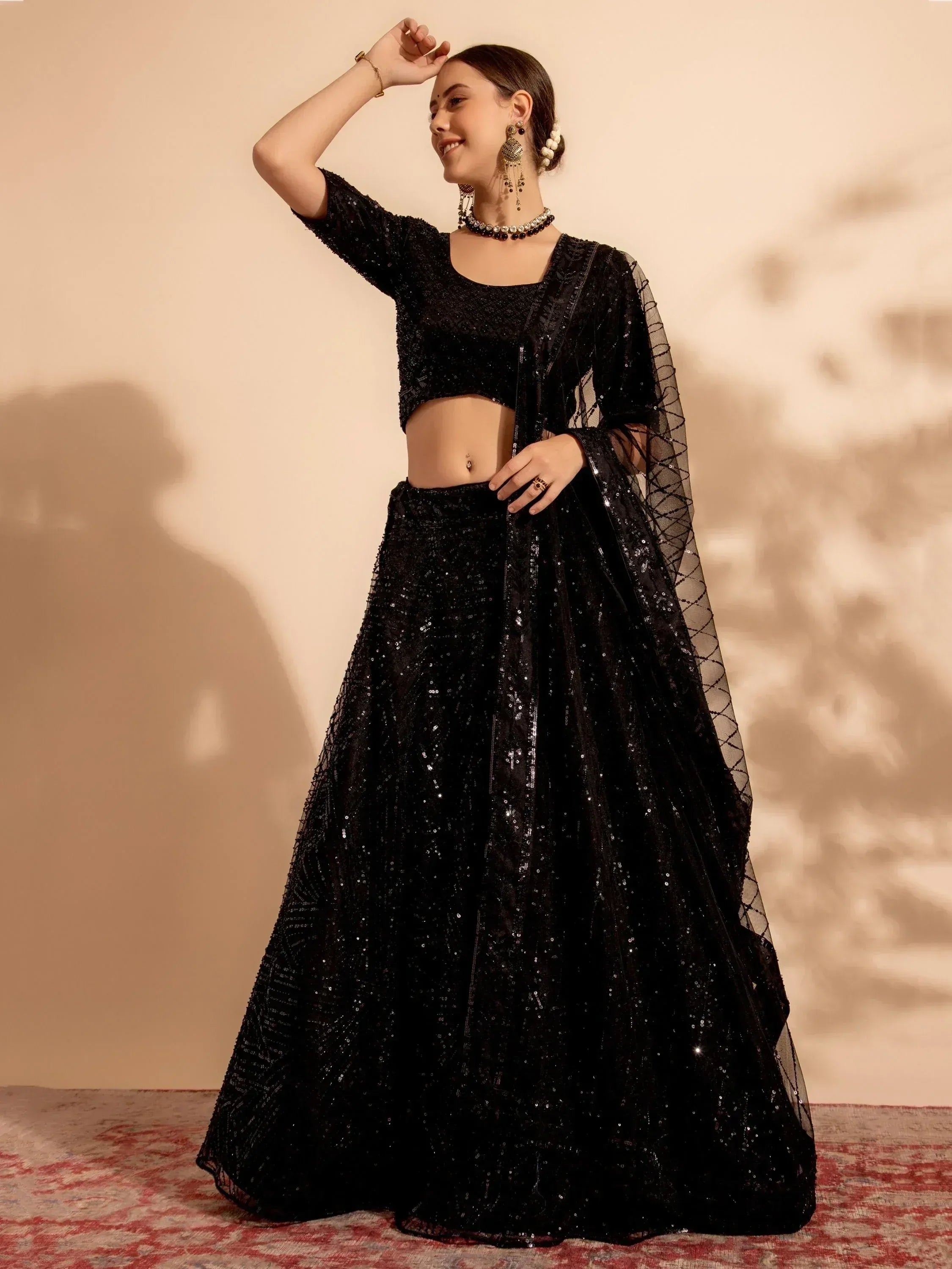 Black sequin lehenga choli with sheer dupatta, ethnic Indian wear for weddings and parties