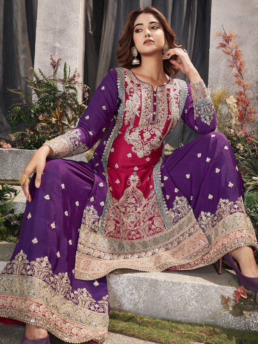 Purple and maroon embroidered salwar kameez with intricate gold detailing, perfect for ethnic occasions.