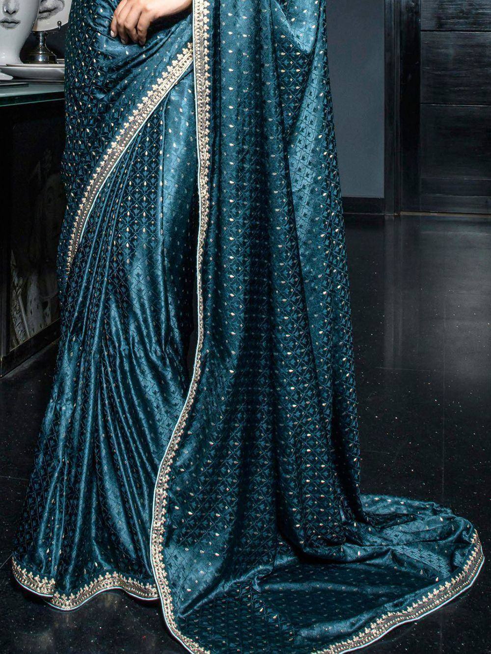 Teal velvet saree with gold embroidery, elegant Indian ethnic wear for festive occasions