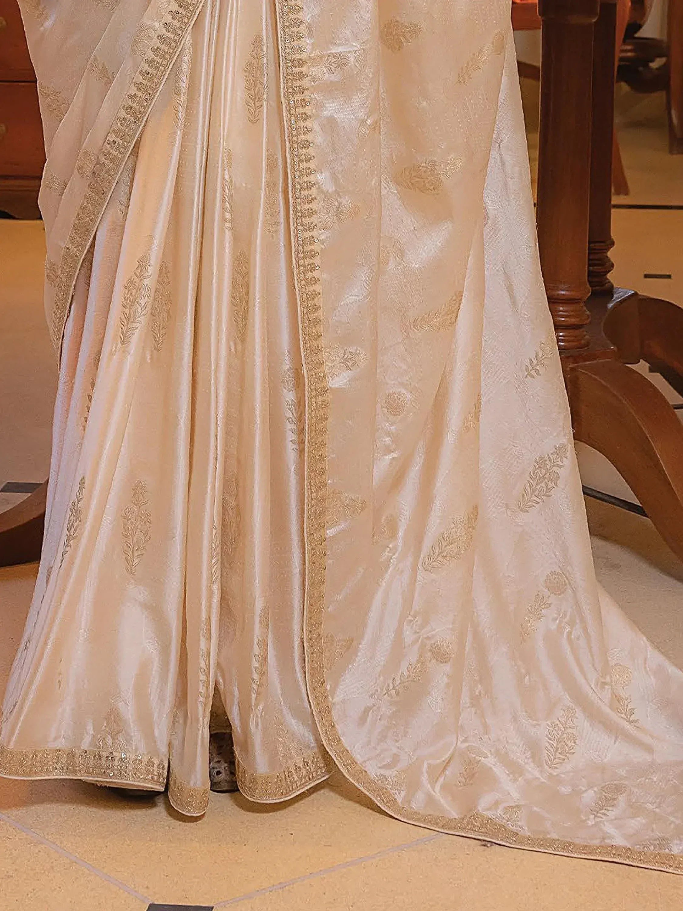 Cream designer lehenga choli with gold embroidery and sheer dupatta, ethnic Indian wear