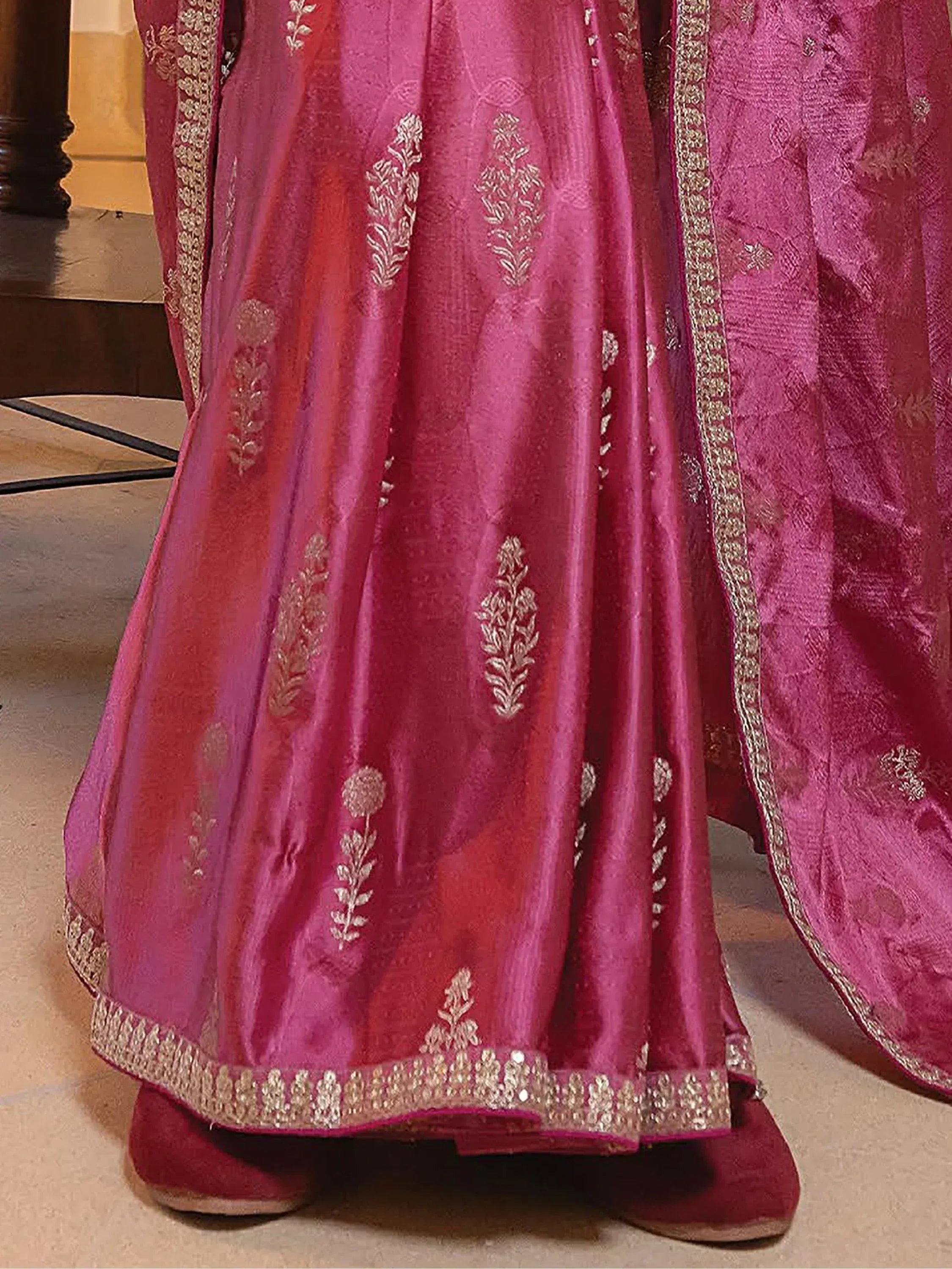 Pink Indian ethnic lehenga with gold floral embroidery and border, traditional designer wear