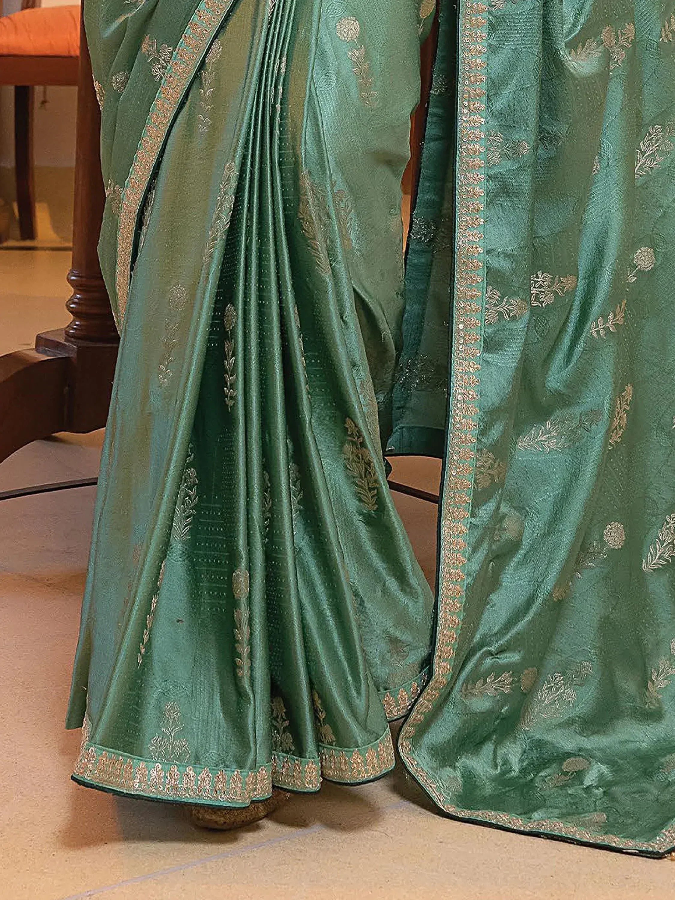 Emerald green silk saree with gold floral embroidery and border, Indian ethnic wear