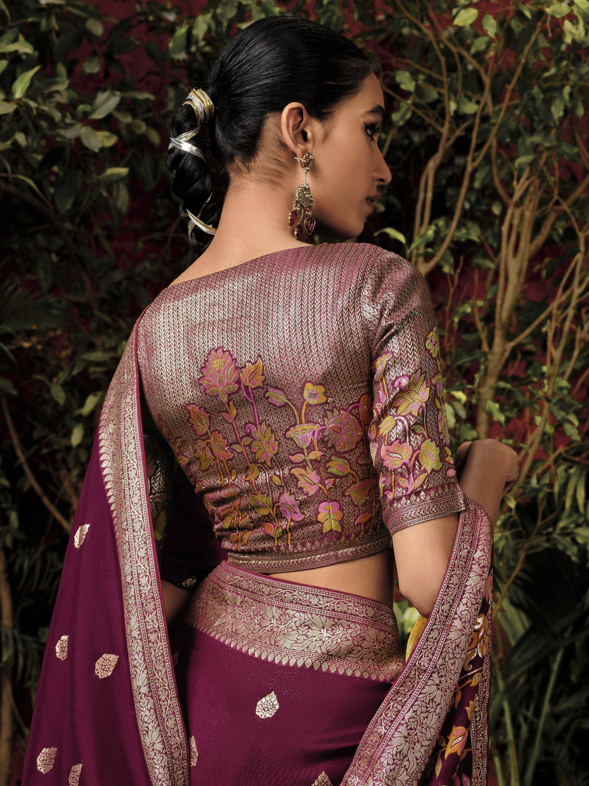 Elegant maroon saree with gold floral embroidery and designer blouse, perfect for Indian ethnic occasions.