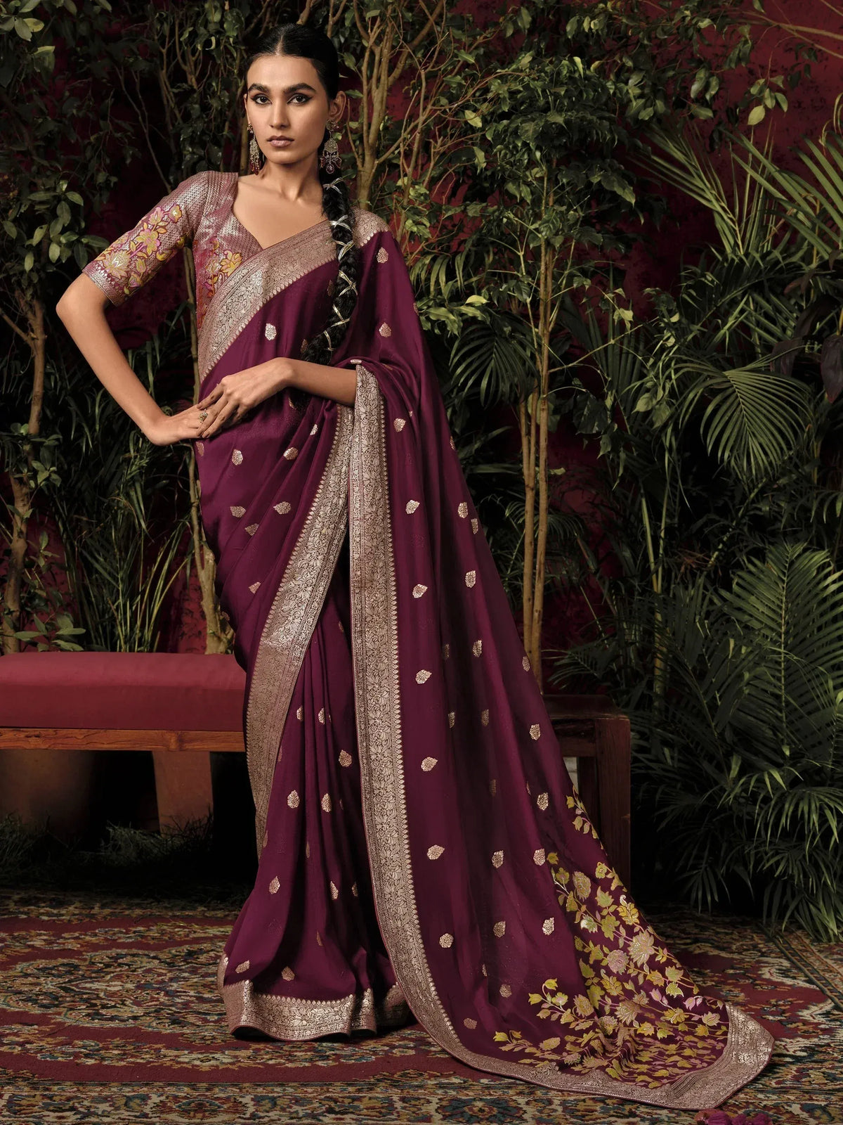 Elegant purple designer saree with gold embroidery and floral blouse, perfect for Indian ethnic occasions