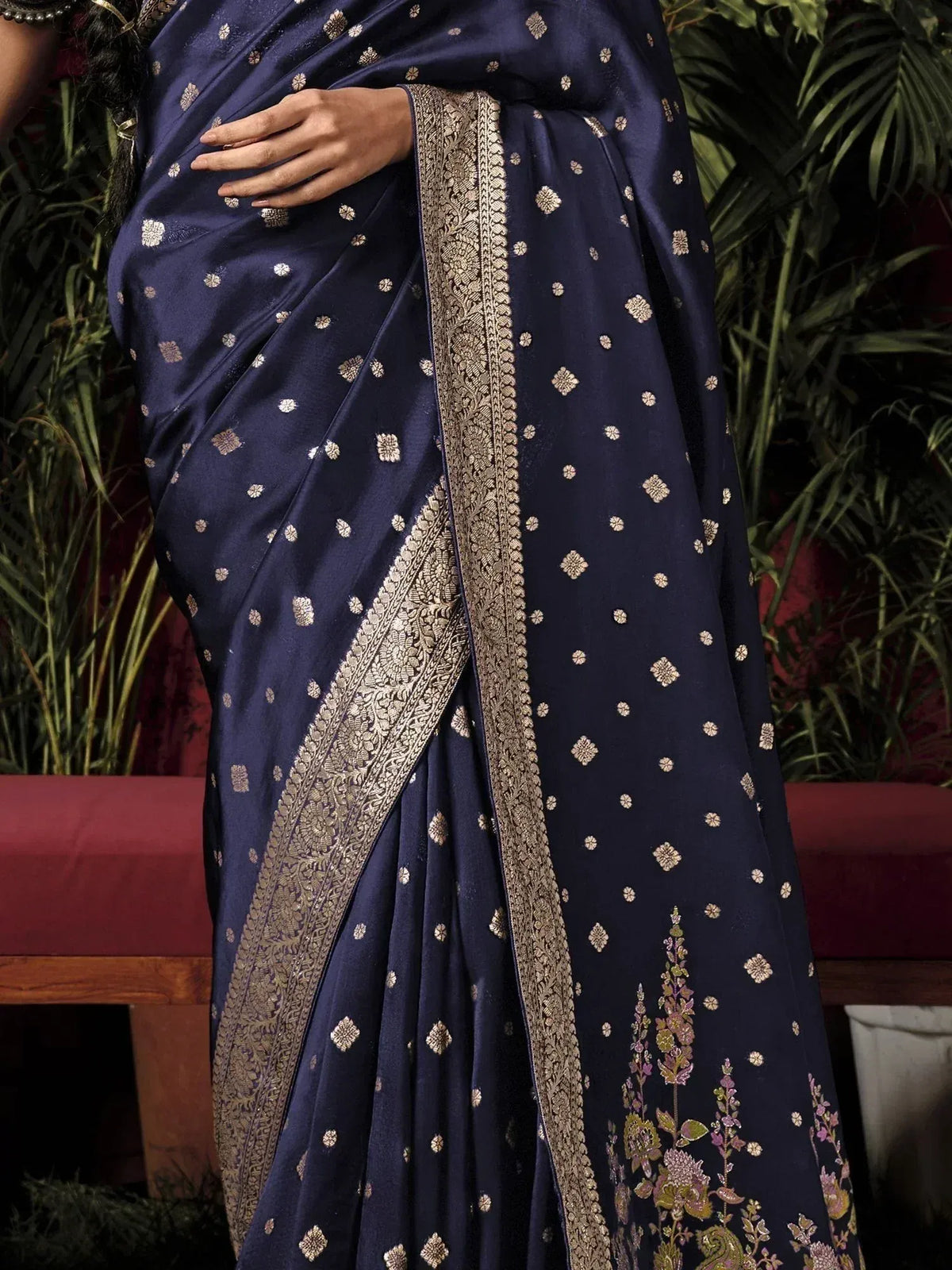 Navy blue silk saree with gold floral motifs and intricate border, ideal for Indian ethnic occasions