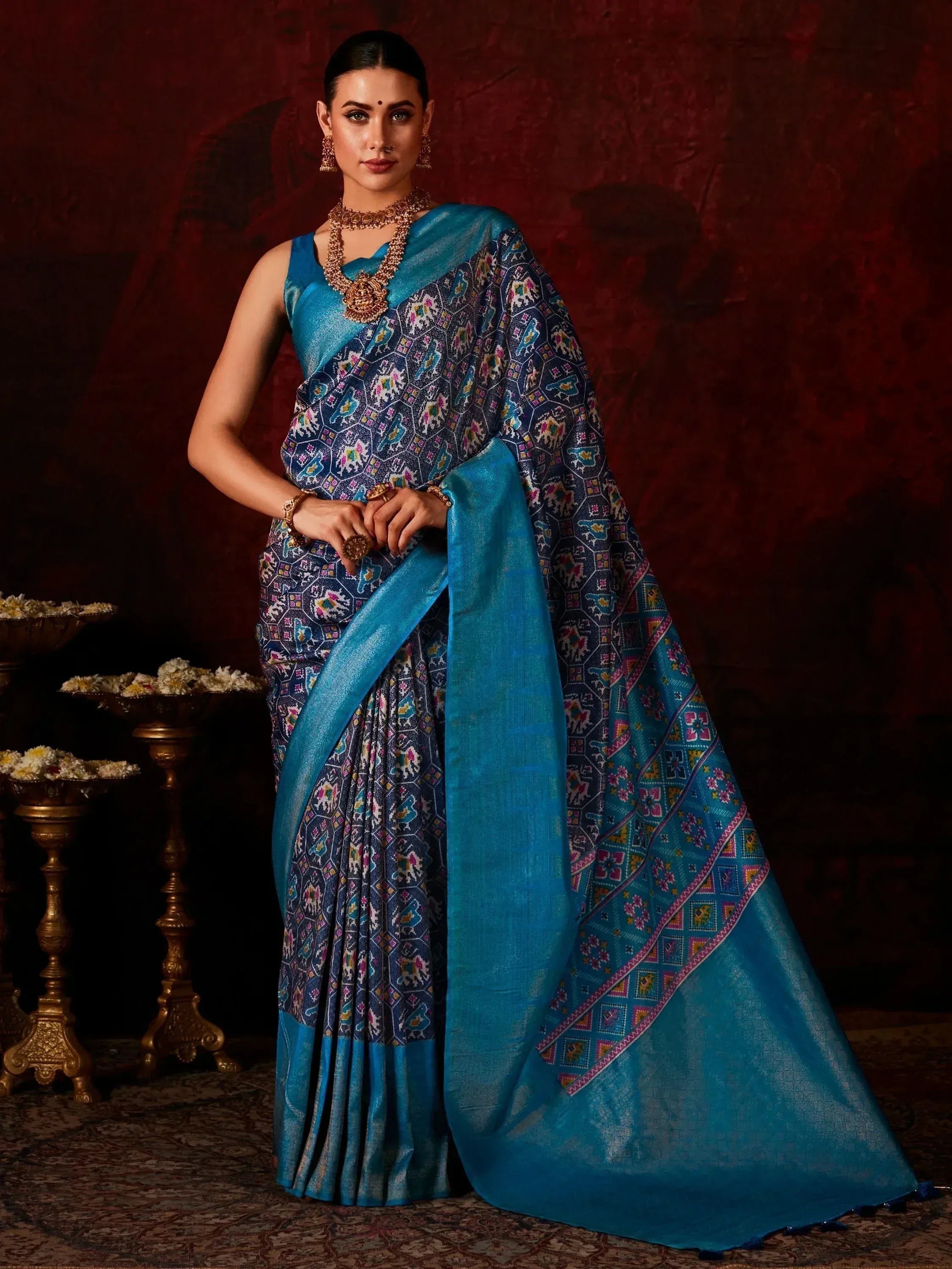 Blue printed saree with ethnic motifs, perfect for Indian weddings and festive occasions