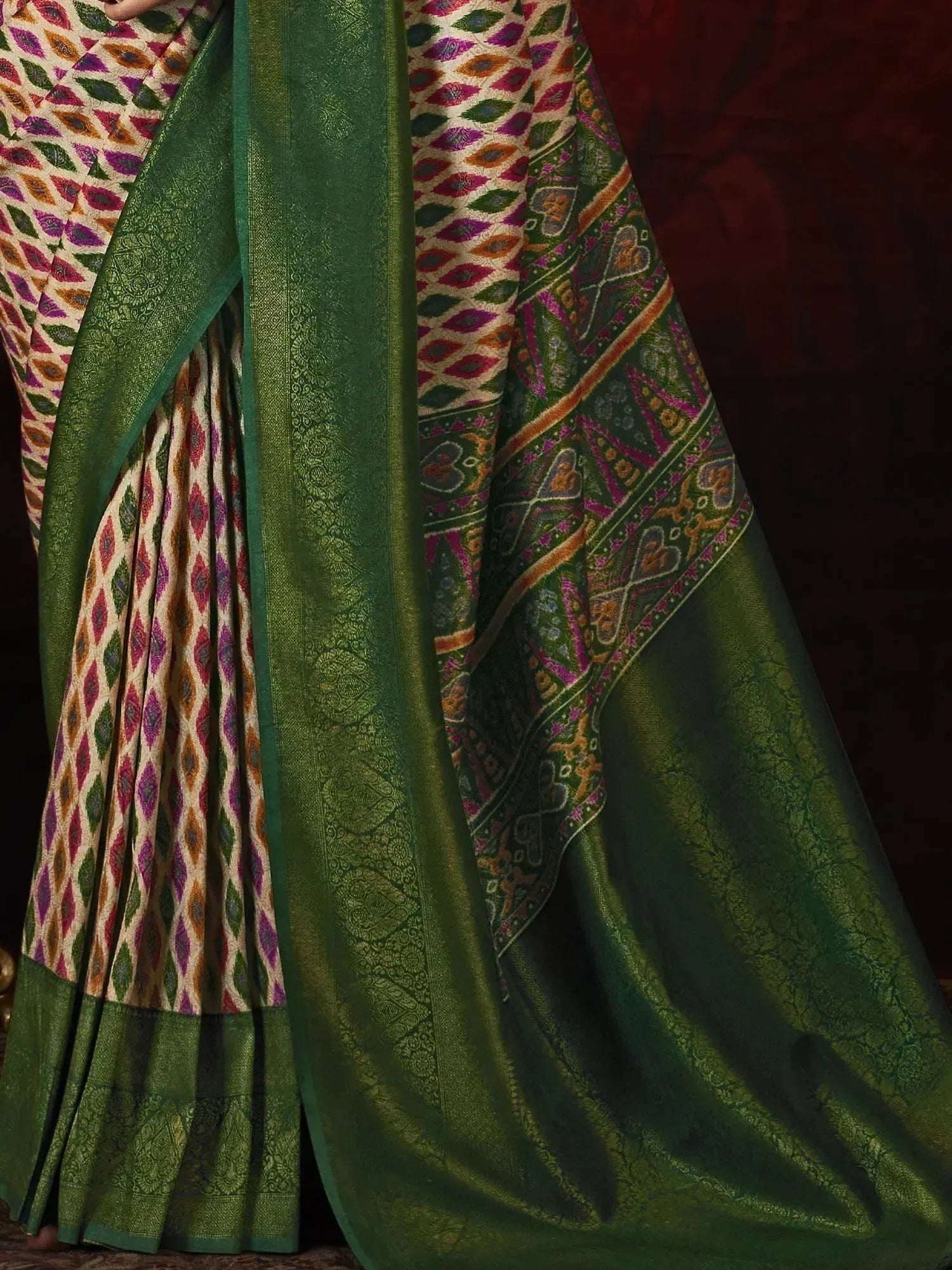 Green and multicolor ethnic saree with intricate geometric and paisley patterns, perfect for Indian occasions.