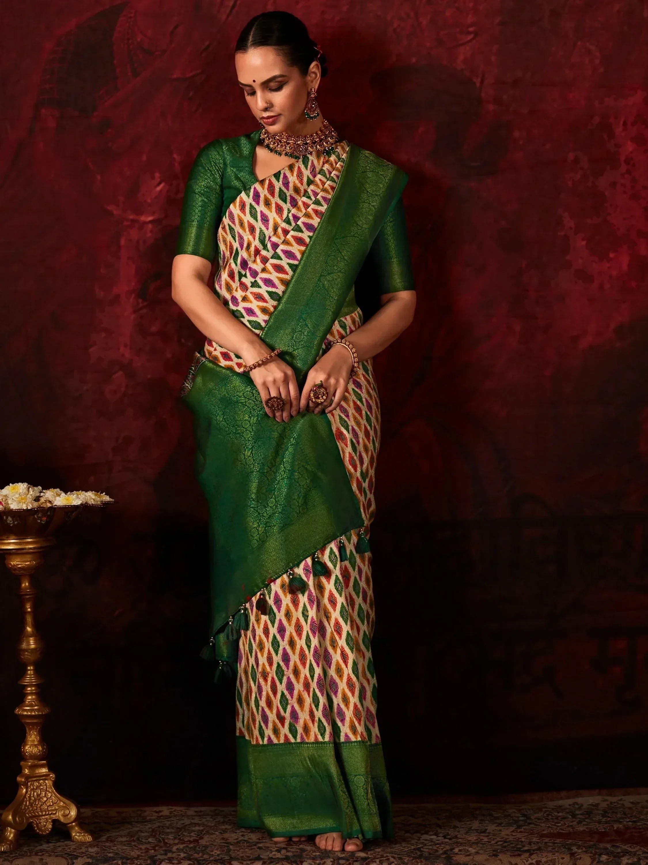 Green and multicolor ethnic saree with geometric print, perfect for Indian occasions and festivals