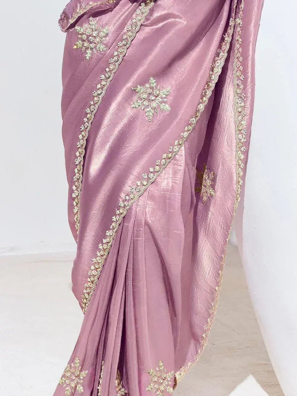 Dusty pink saree with gold floral embroidery and scalloped border, elegant ethnic wear for women