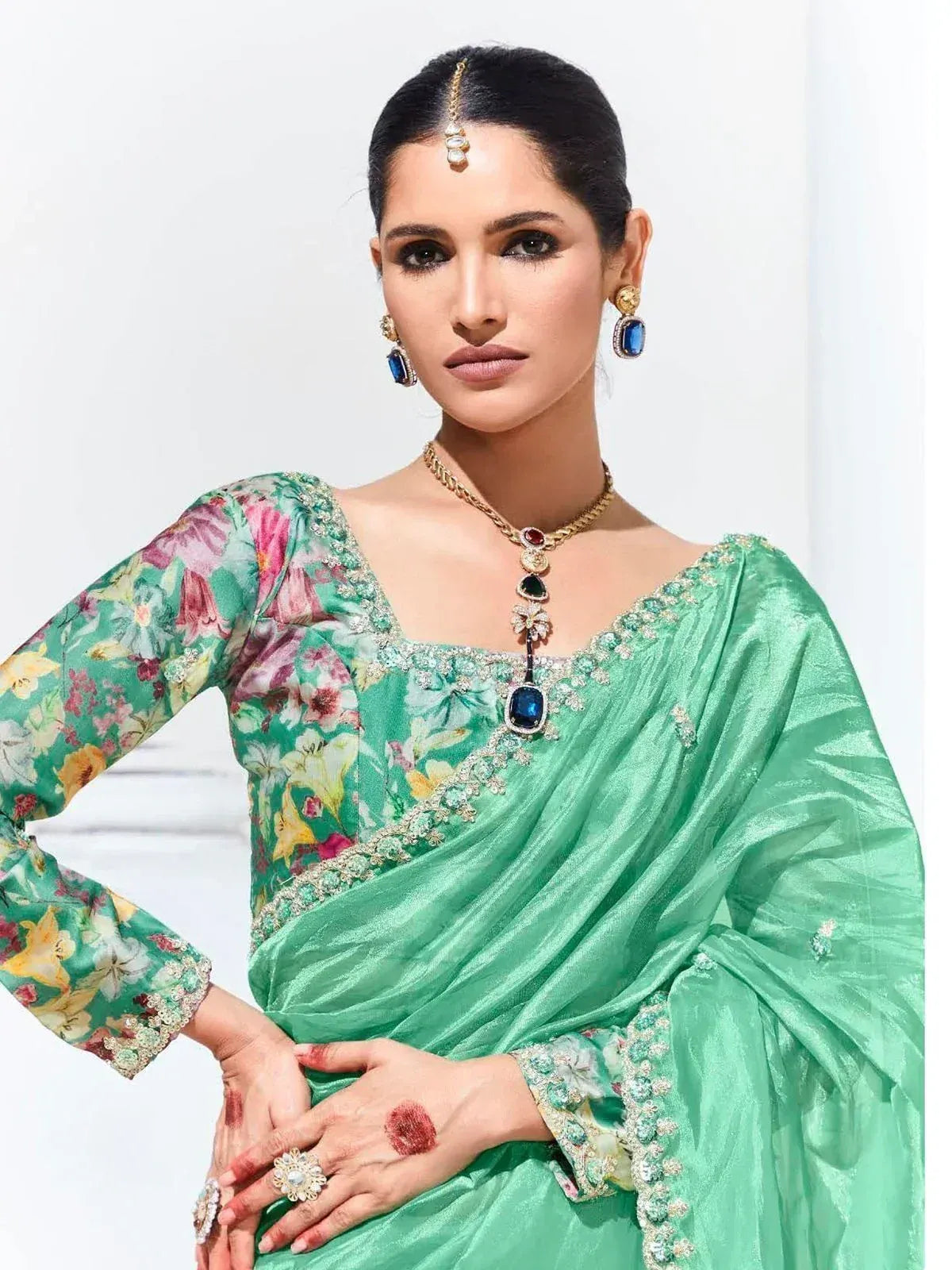 Enchanting Teal Green Embroidered Organza Engagement Wear Saree
