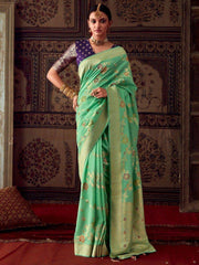 Fascinating Light Green Zari Weaving Georgette Function Wear Saree