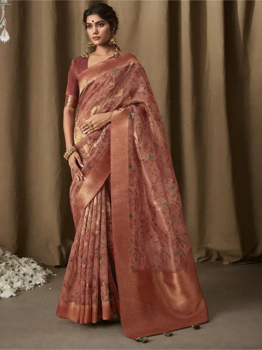 Elegant Indian saree with floral embroidery and golden border, perfect for ethnic occasions