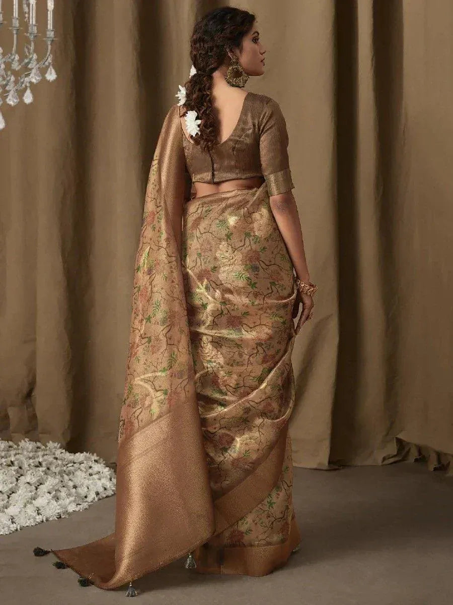 Elegant gold floral saree with matching blouse, perfect for Indian ethnic occasions and weddings.