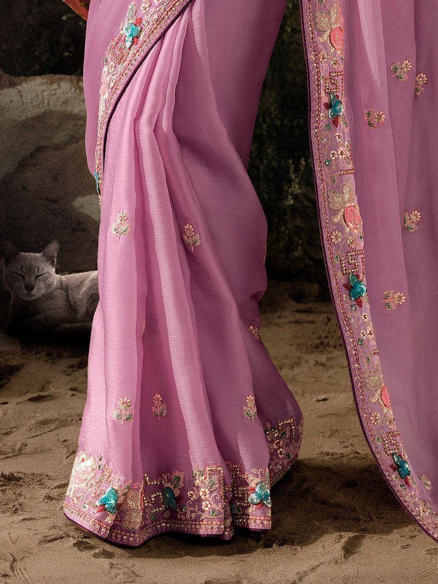 Pink embroidered saree with floral motifs and sequin detailing, perfect for ethnic occasions