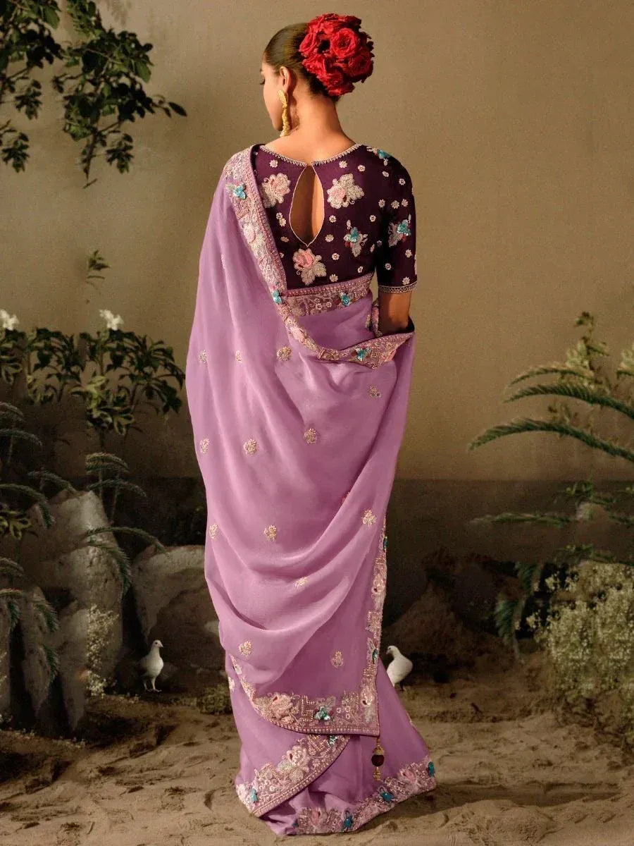 Purple embroidered saree with floral blouse, perfect for Indian ethnic wear occasions
