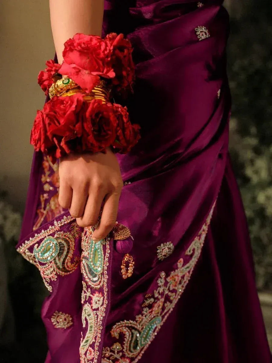 Purple embroidered saree with red rose wrist corsage and gold bangles, Indian ethnic wear