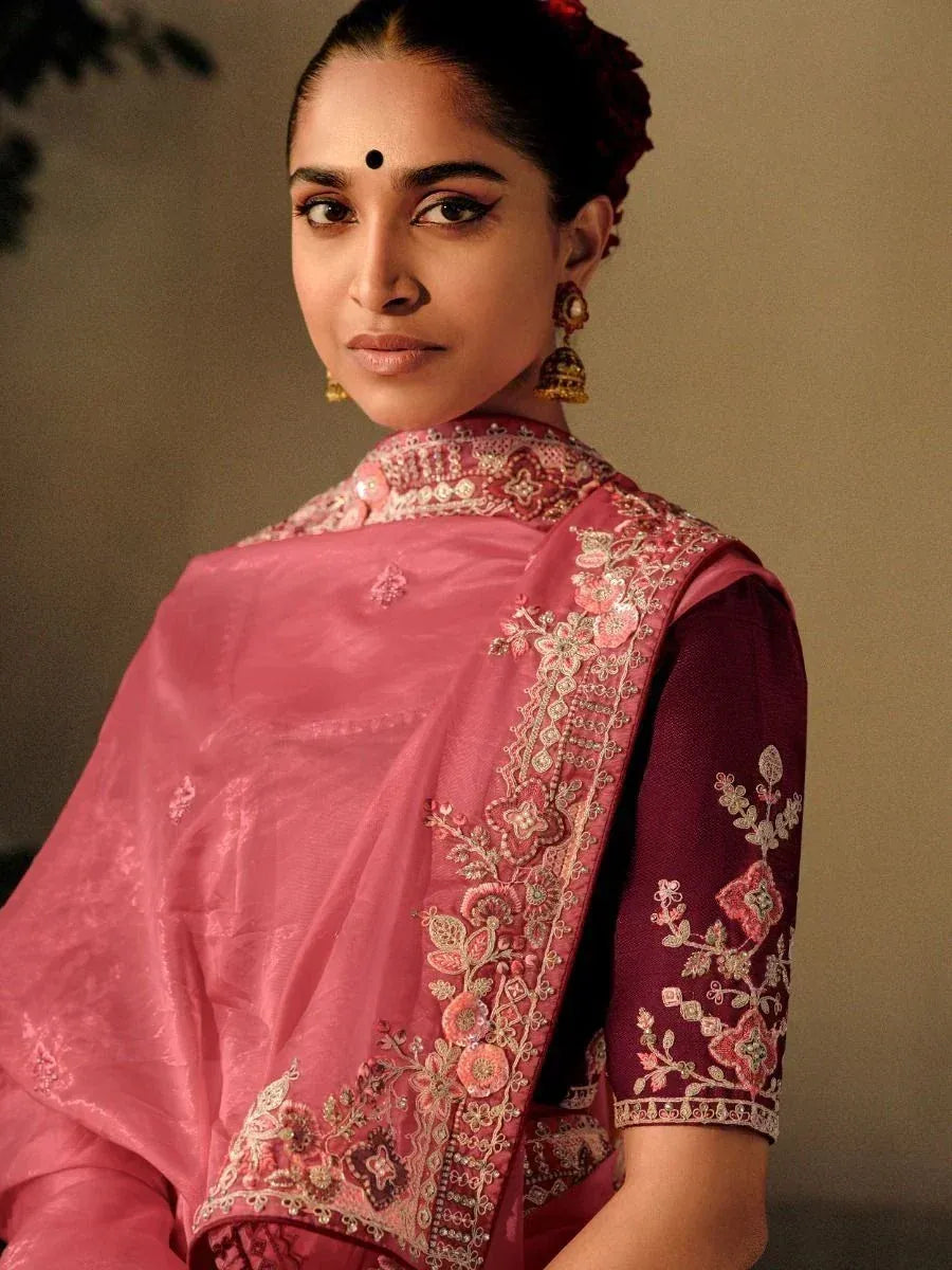 Pink embroidered saree with maroon blouse, floral zari work, traditional Indian ethnic wear