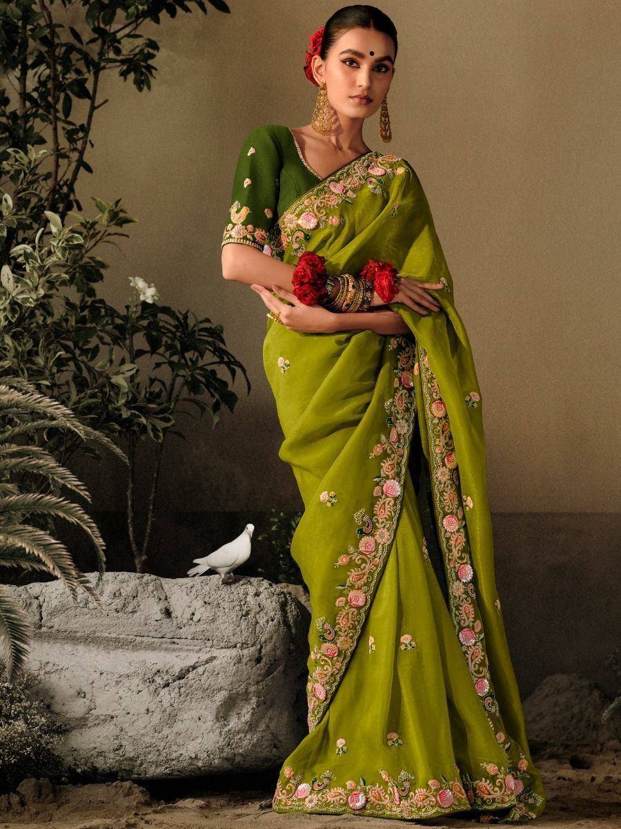 Green embroidered saree with floral border, perfect for Indian ethnic occasions