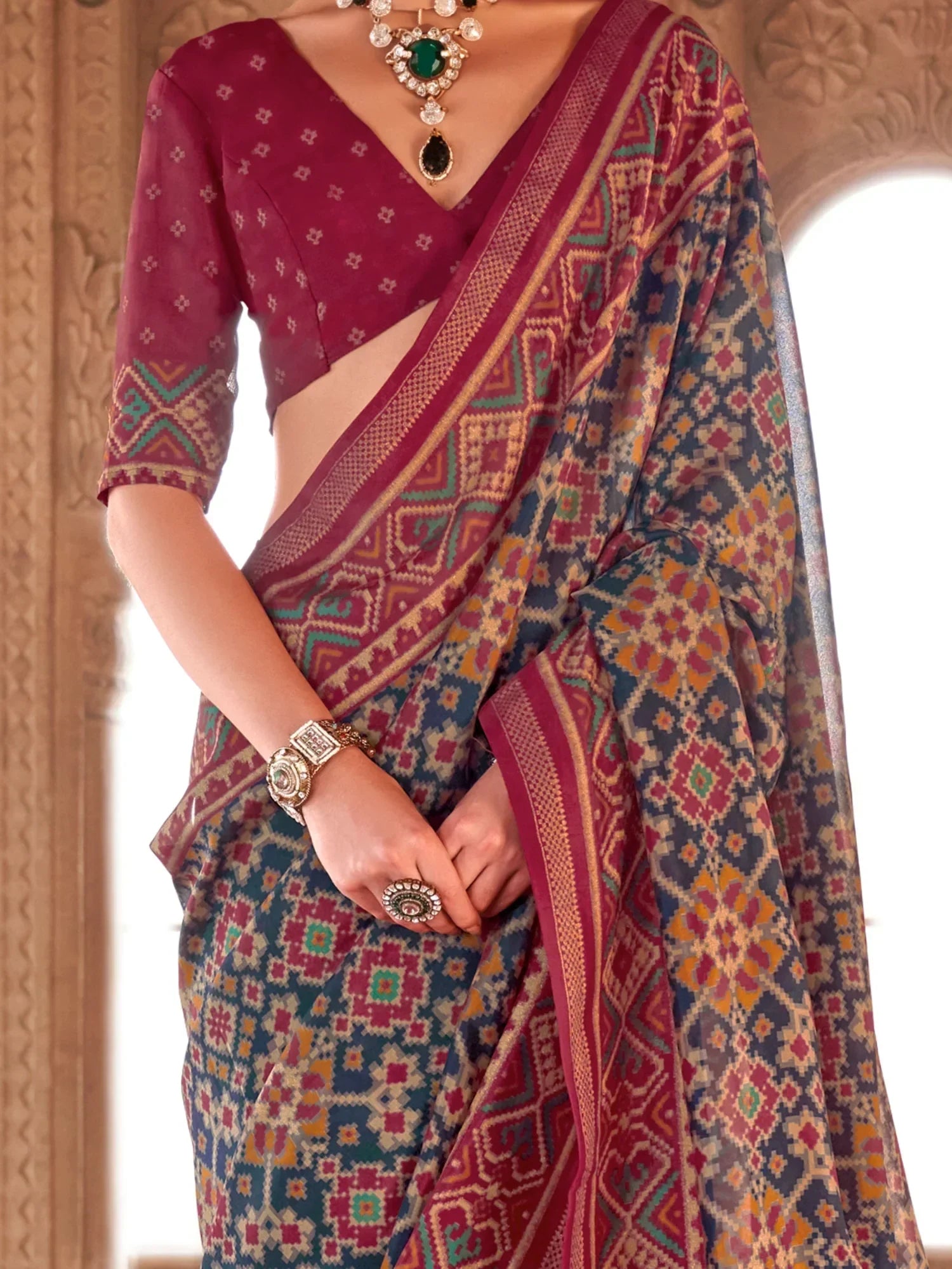 Captivating Navy Blue Patola Printed Georgette Saree With Blouse