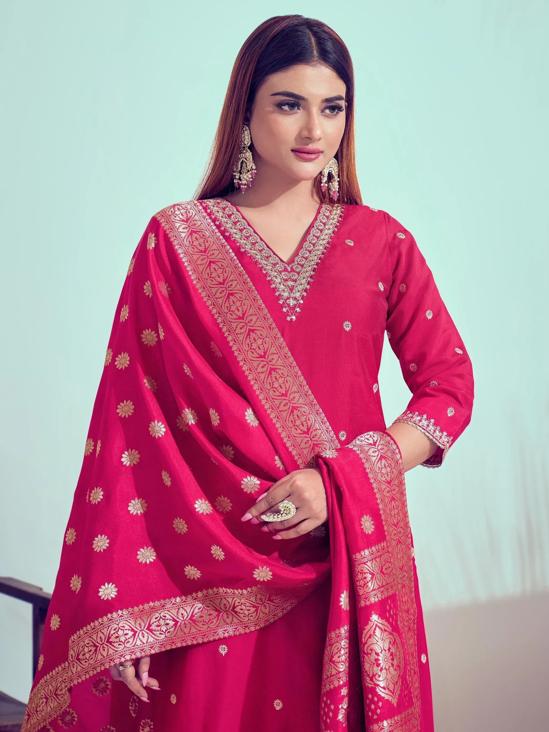 Pink ethnic salwar kameez with gold embroidery and dupatta, perfect for Indian festive wear