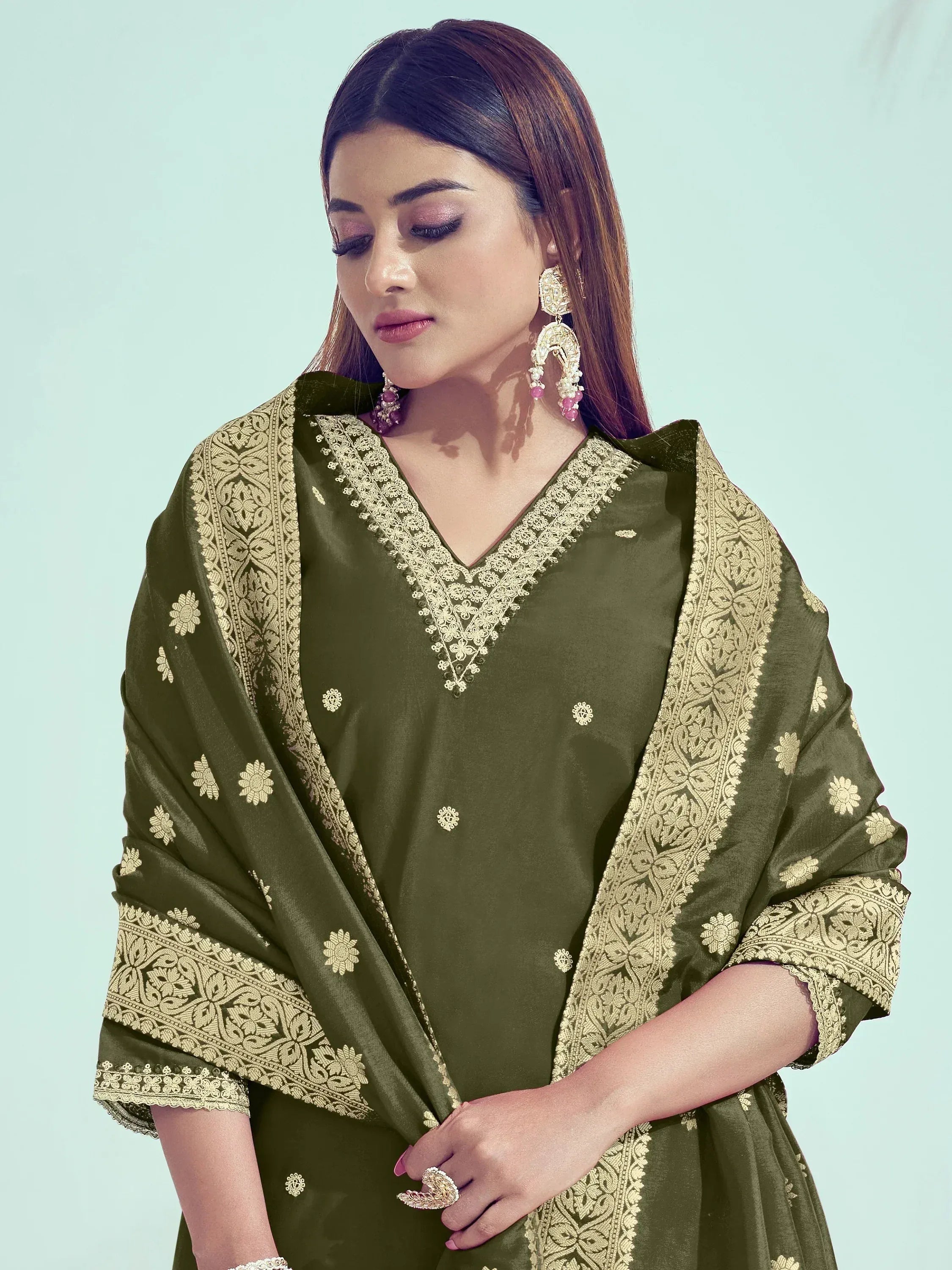 Olive green ethnic salwar kameez with gold embroidery and matching dupatta, perfect for Indian festive occasions.