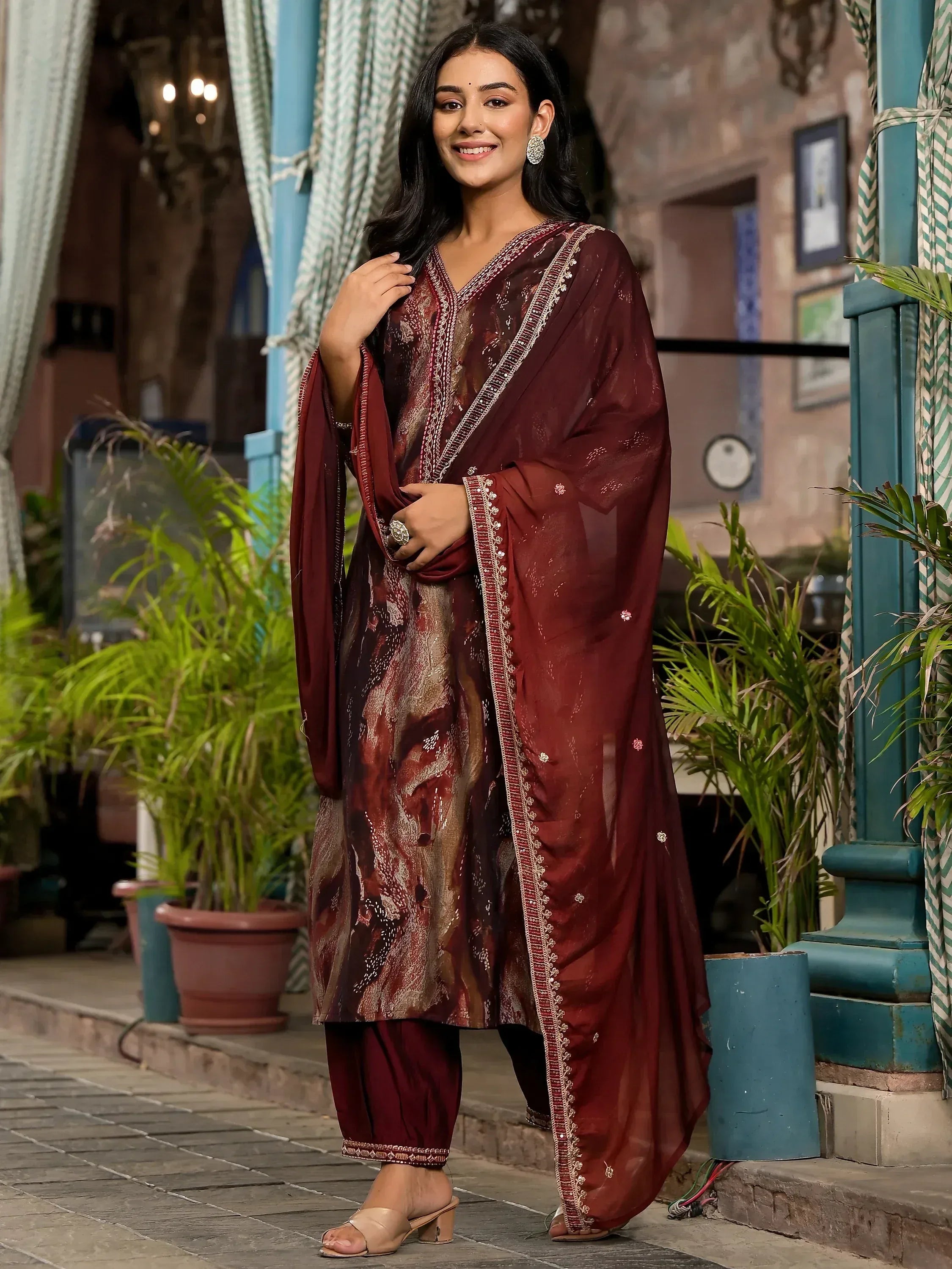 Maroon ethnic salwar kameez with embroidered dupatta, perfect for Indian occasions and festive wear.