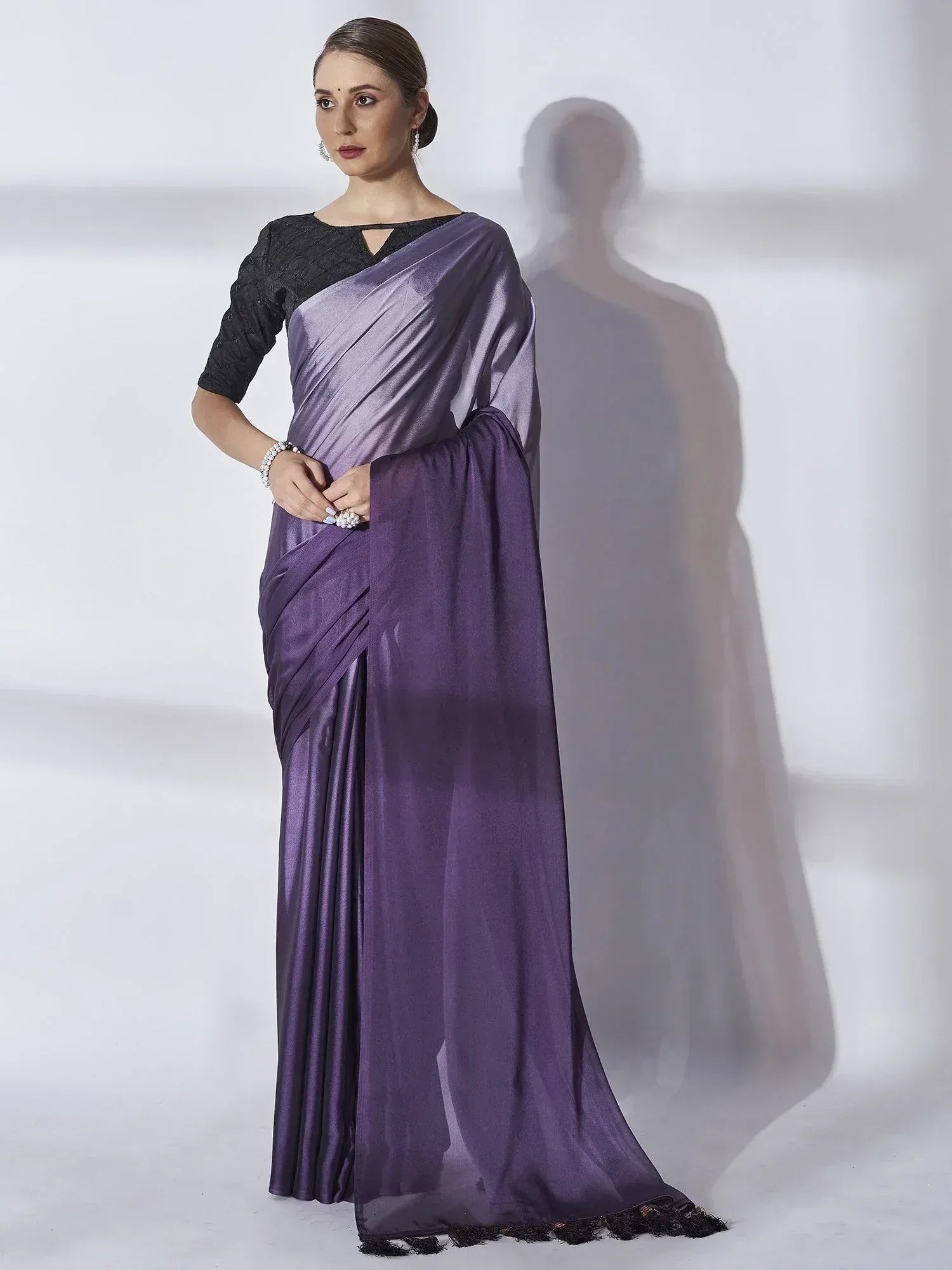 Elegant purple satin saree with black blouse, perfect for Indian ethnic wear occasions