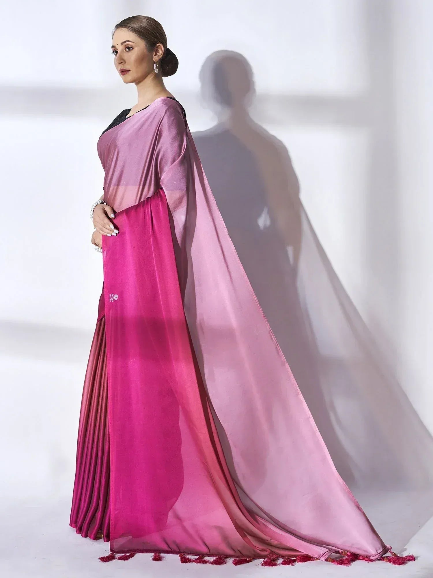 Elegant pink ombre saree with black blouse, perfect for Indian ethnic wear occasions