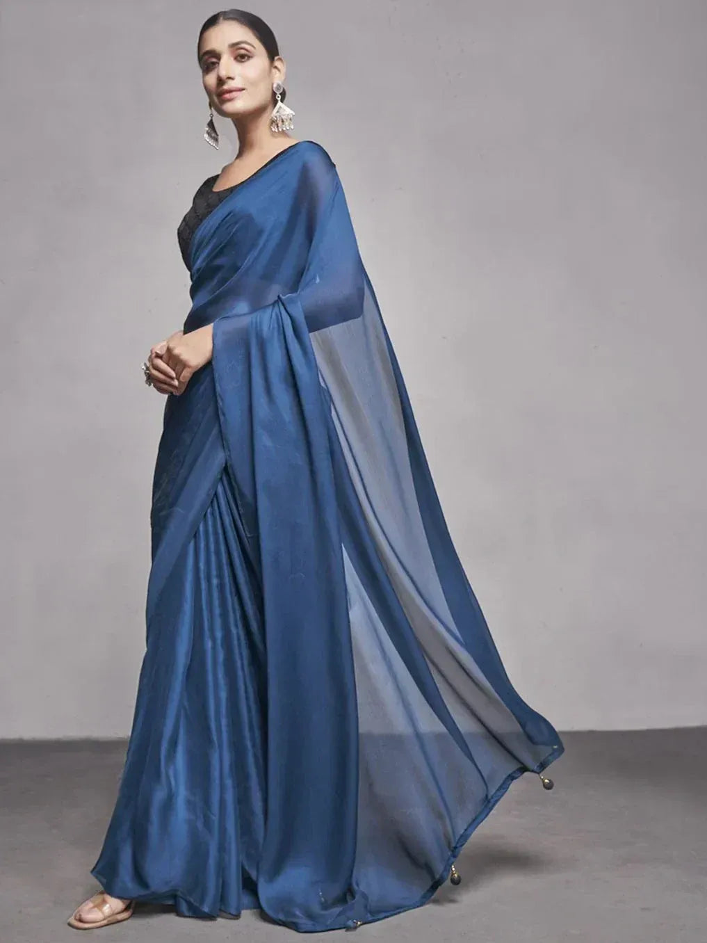 Elegant blue saree with sheer pallu and black blouse, perfect for Indian ethnic occasions