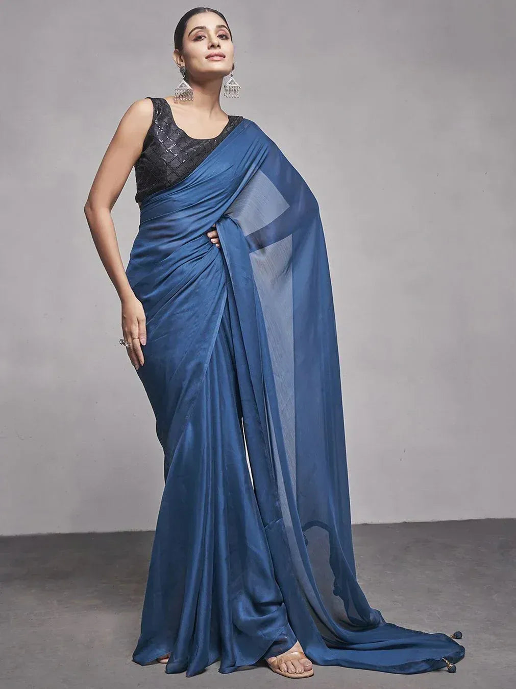 Elegant blue saree with black sequin blouse, perfect for Indian ethnic occasions