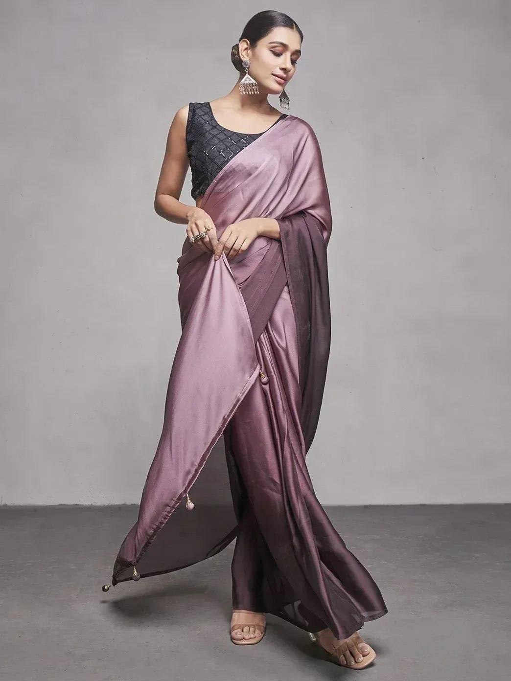 Elegant mauve silk saree with black blouse, perfect for Indian ethnic occasions and festive wear.