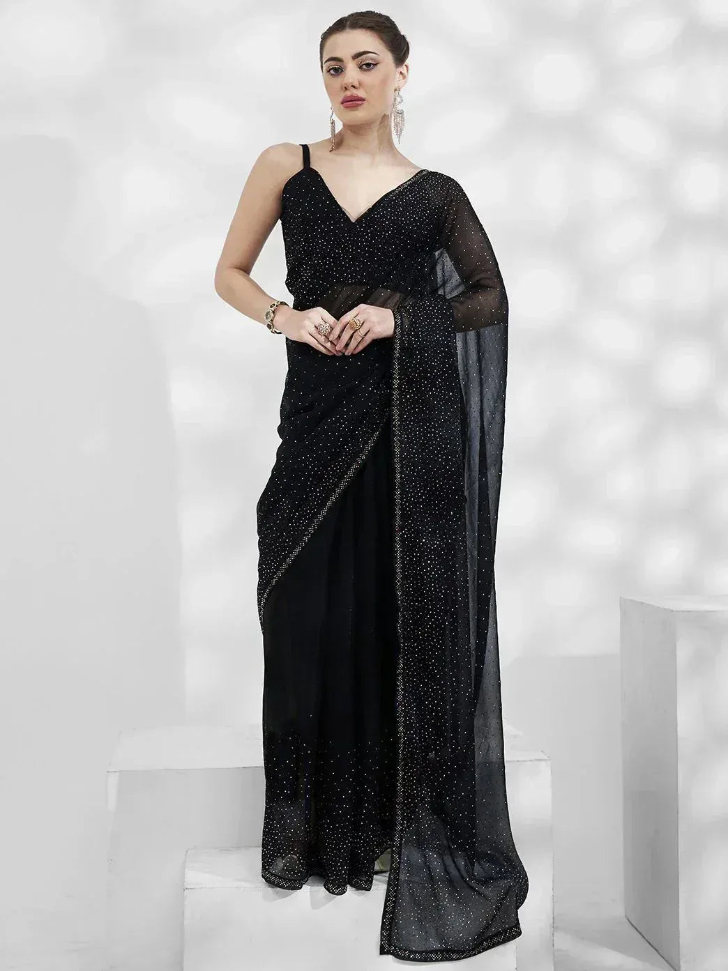 Black sequin saree with sheer blouse, elegant Indian ethnic wear for parties