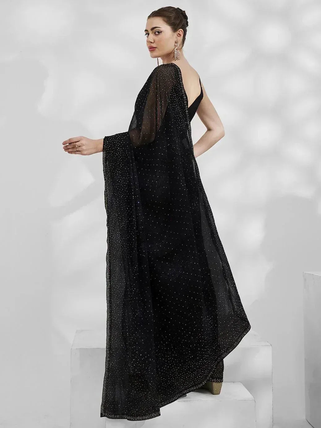 Black ethnic gown with sheer sleeves and sequin detailing, perfect for festive occasions
