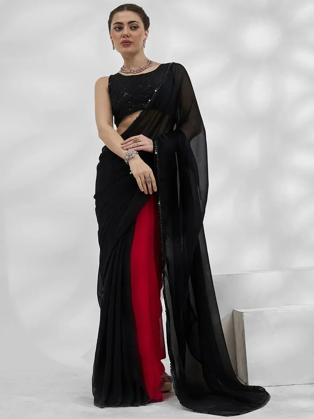 Black sheer saree with red inner, embellished blouse, ethnic Indian wear for women