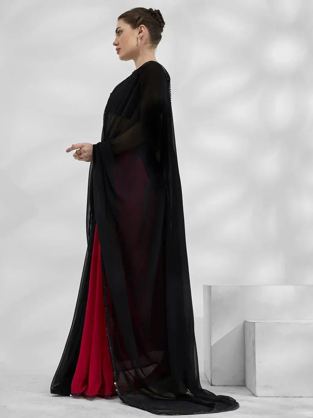 Black sheer cape over maroon ethnic gown, elegant Indian wear for women