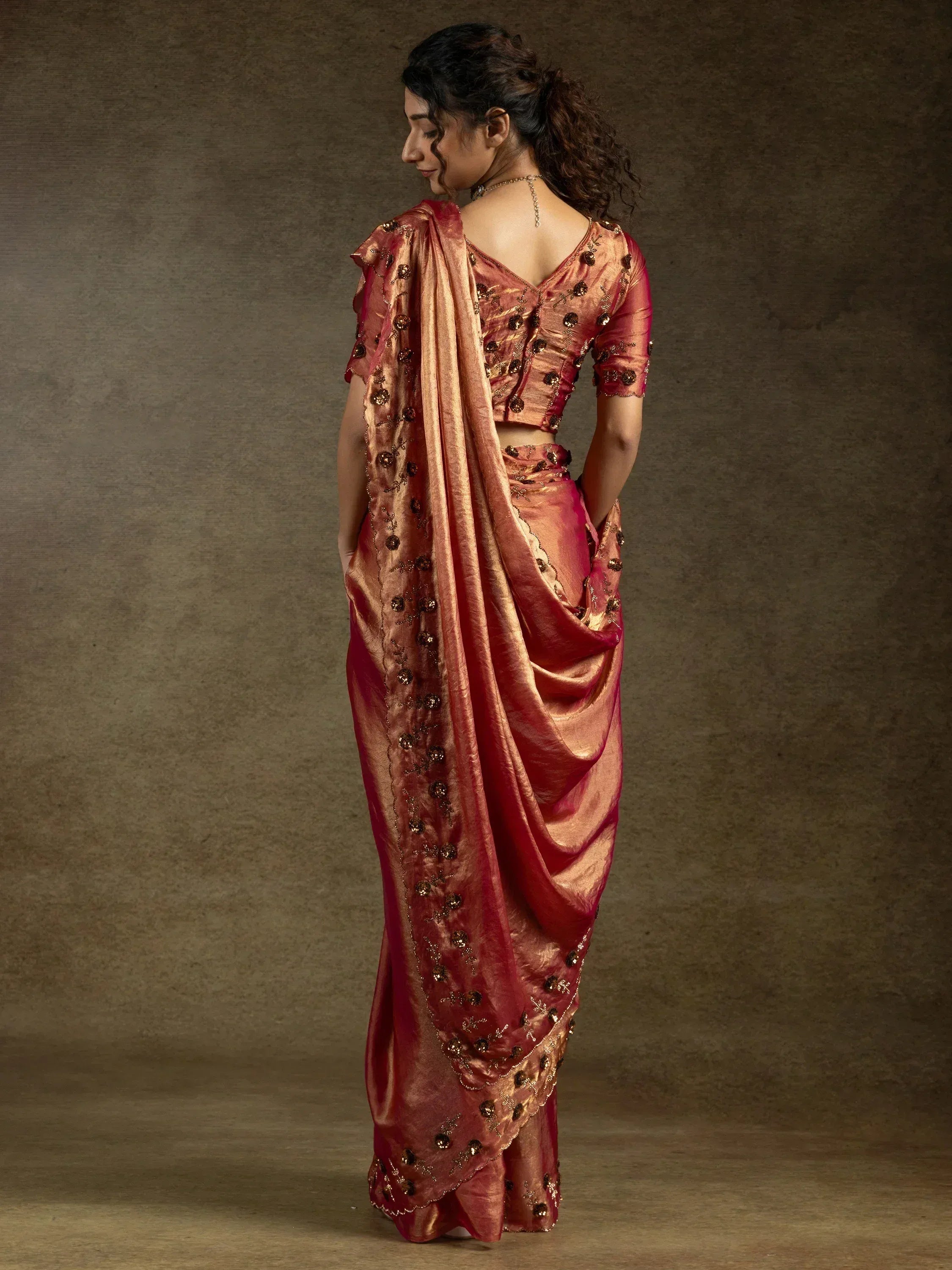 Elegant maroon saree with golden embroidery and designer blouse for ethnic wear