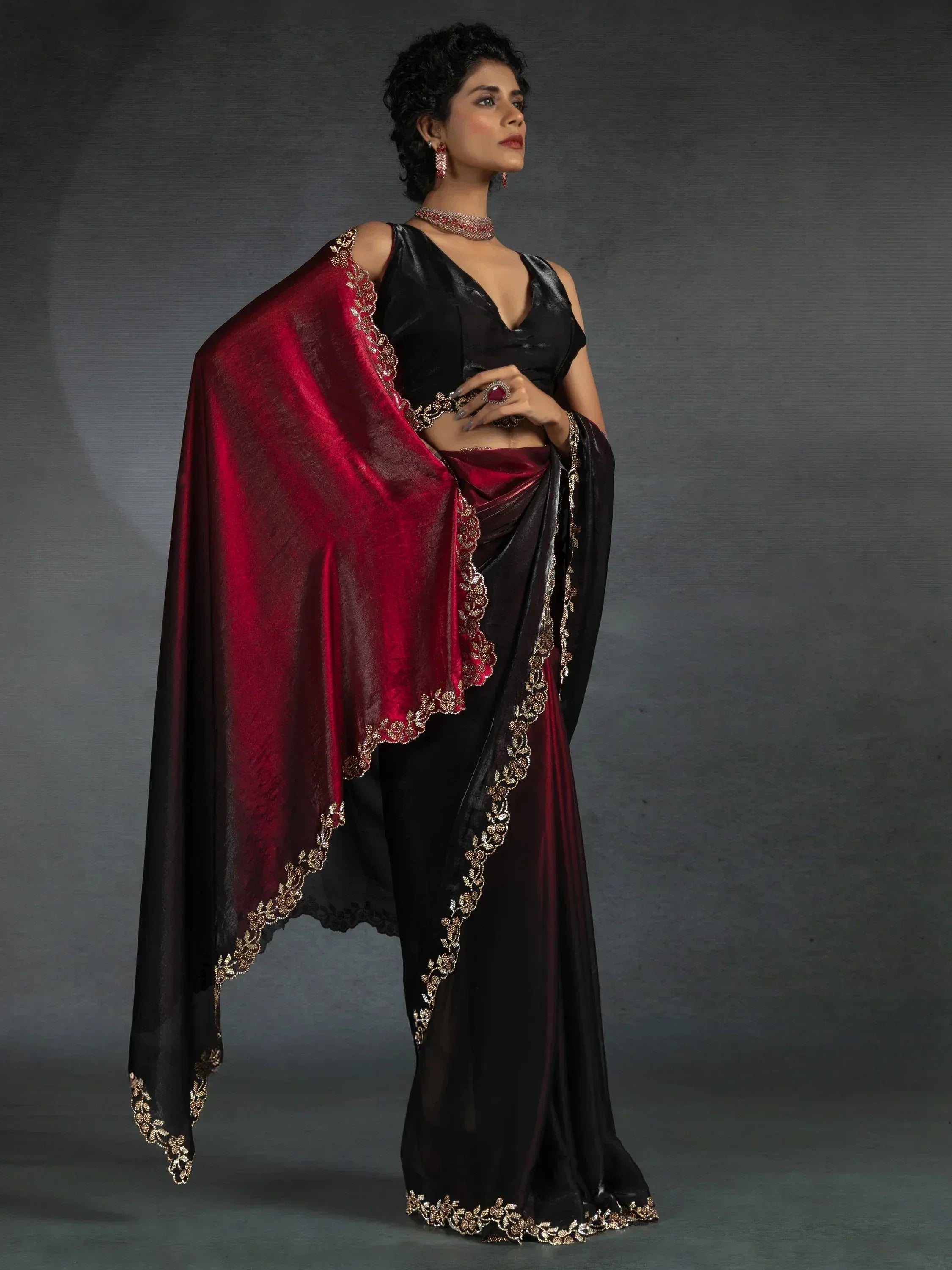 Black and maroon saree with gold embroidery, elegant ethnic wear for women