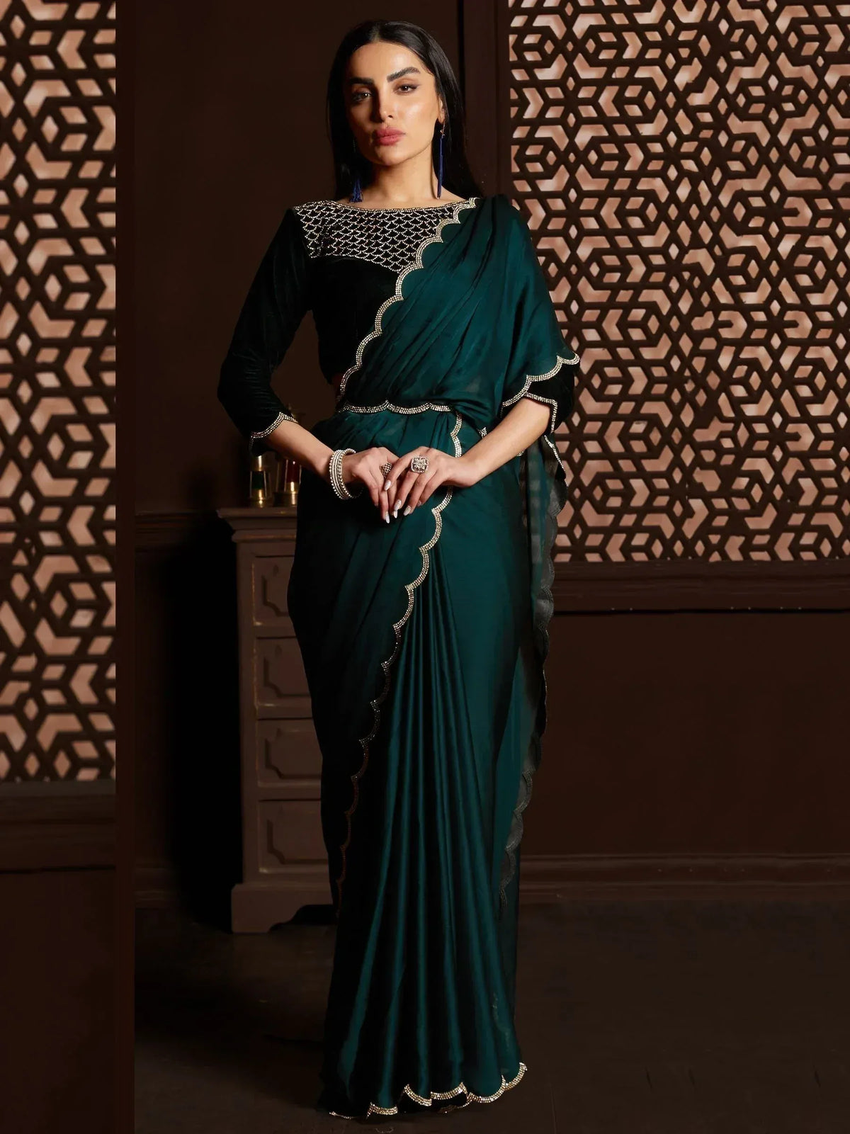 Emerald green saree with black velvet blouse, scalloped gold embroidery, perfect for Indian ethnic wear occasions