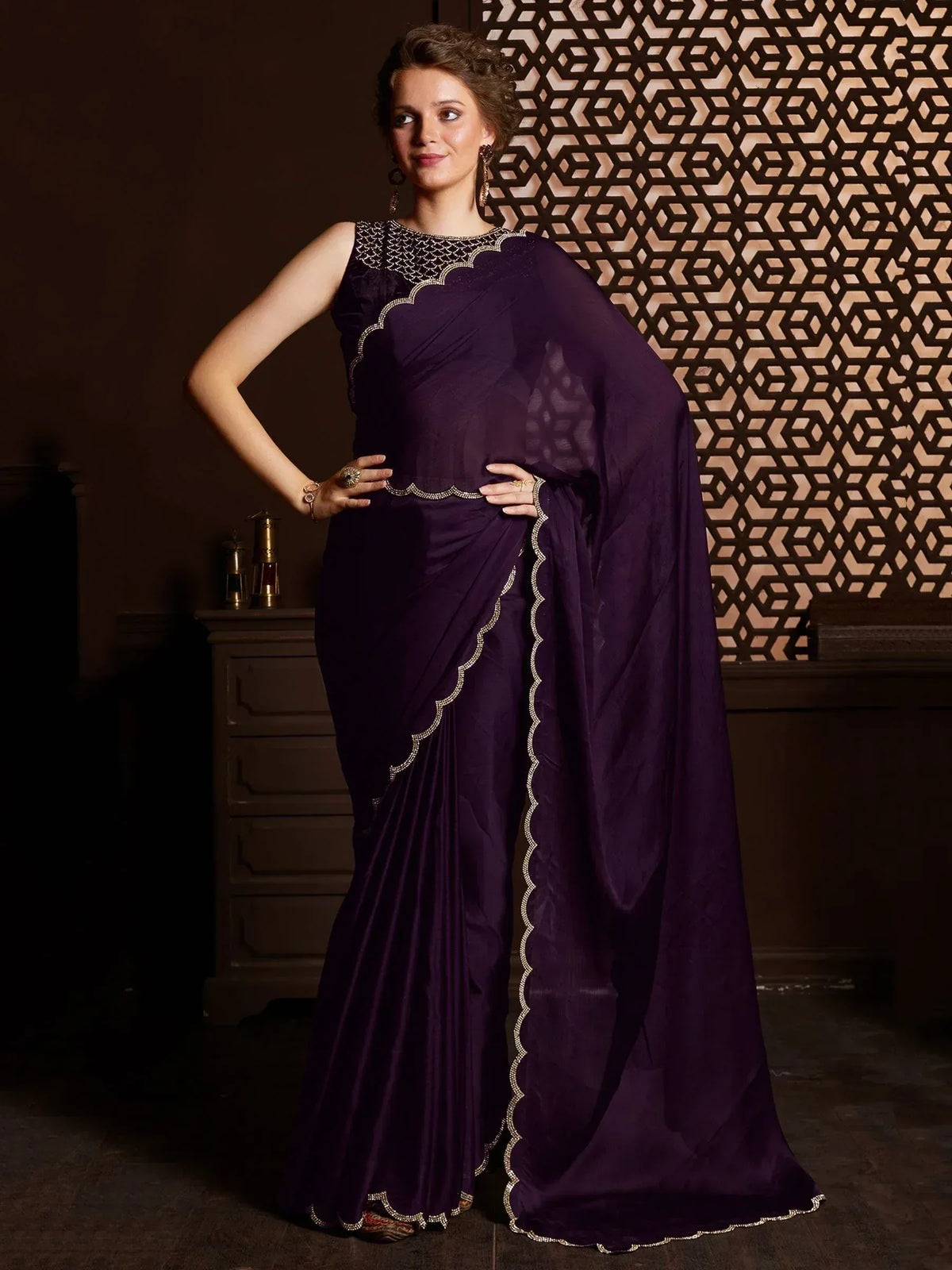 Elegant purple saree with gold scalloped embroidery, perfect for Indian ethnic occasions and festive wear.